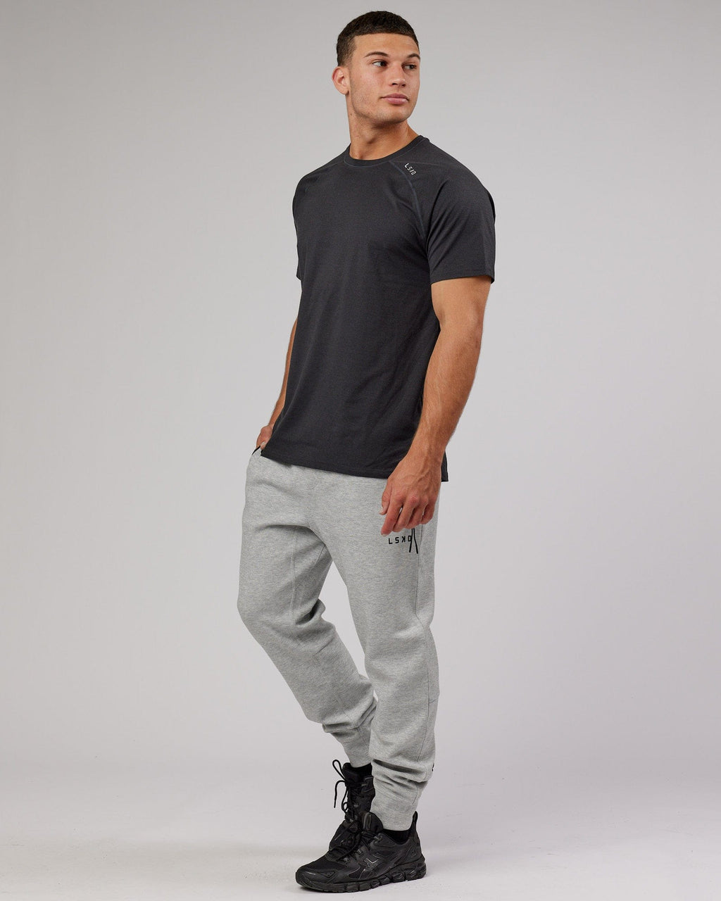 Model wearing Athlete ForgedFleece Zip Trackpant - Lt Grey Marl