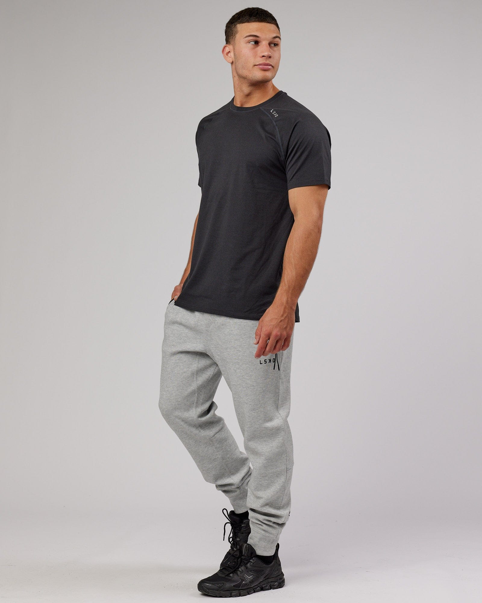 Model wearing Athlete ForgedFleece Zip Trackpant - Lt Grey Marl