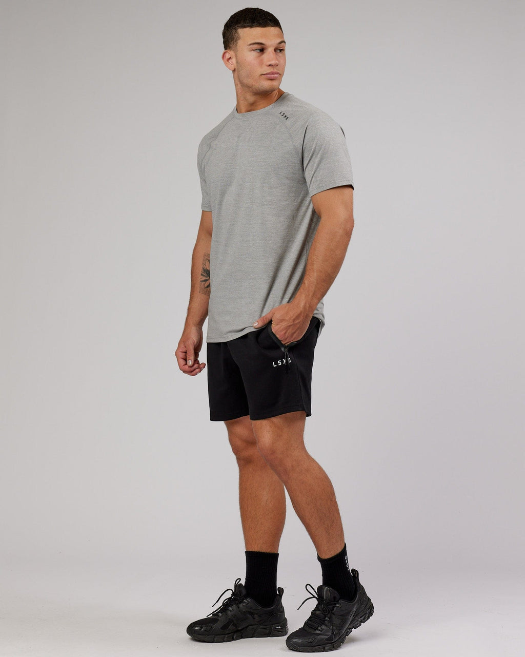 Model wearing Athlete ForgedFleece Track Short - Black