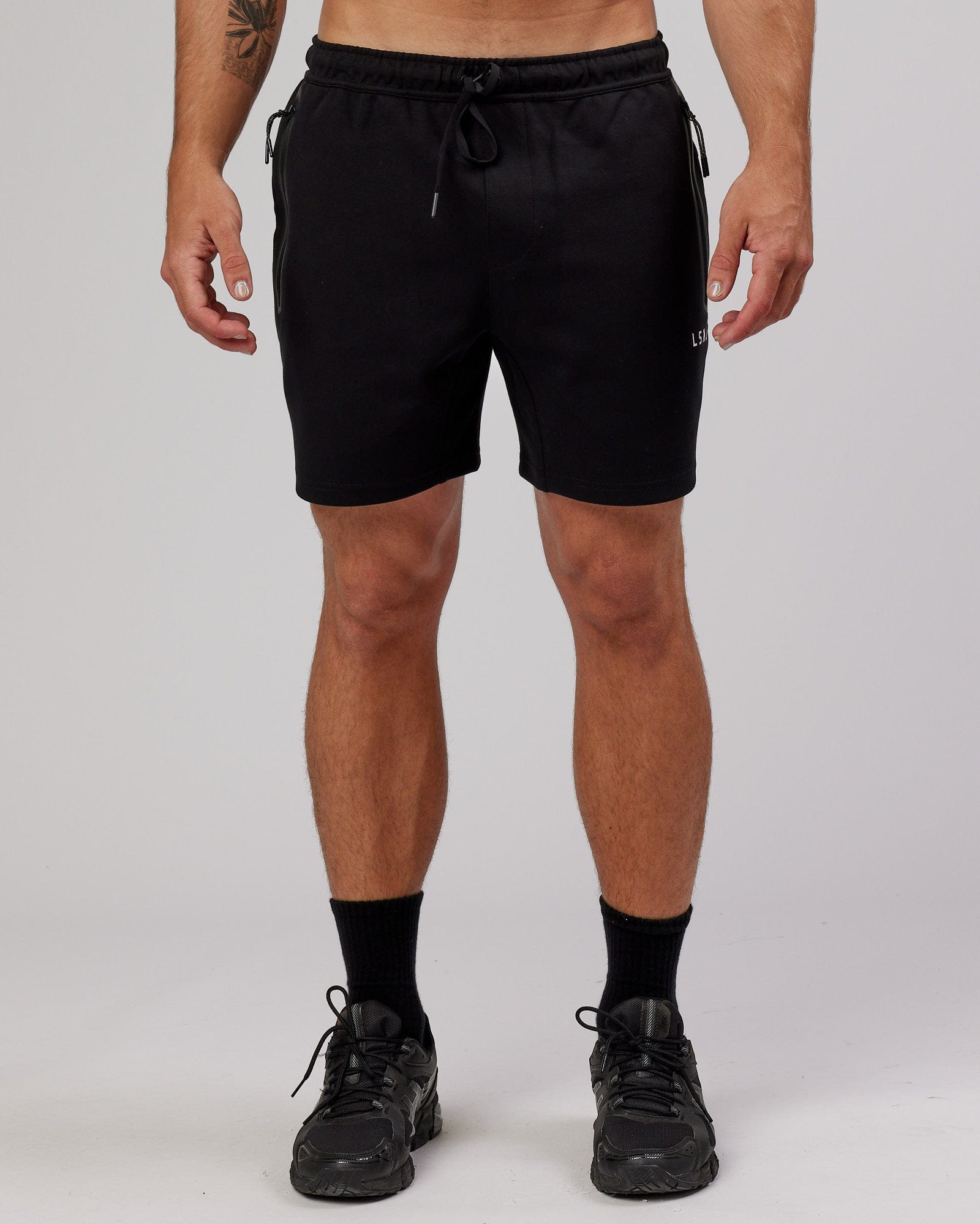 Model wearing Athlete ForgedFleece Track Short - Black