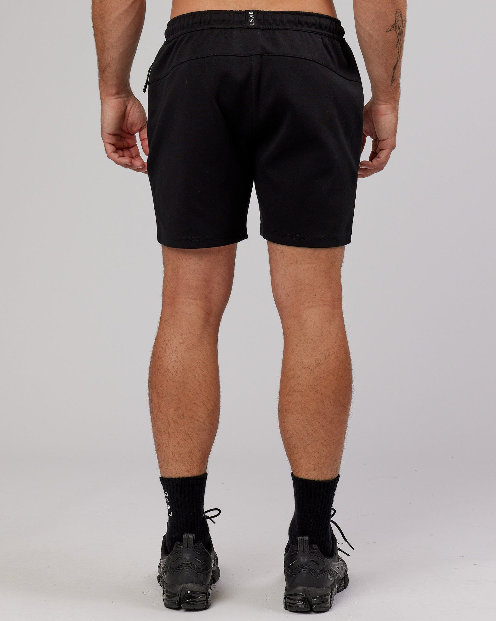 Model wearing Athlete ForgedFleece Track Short - Black