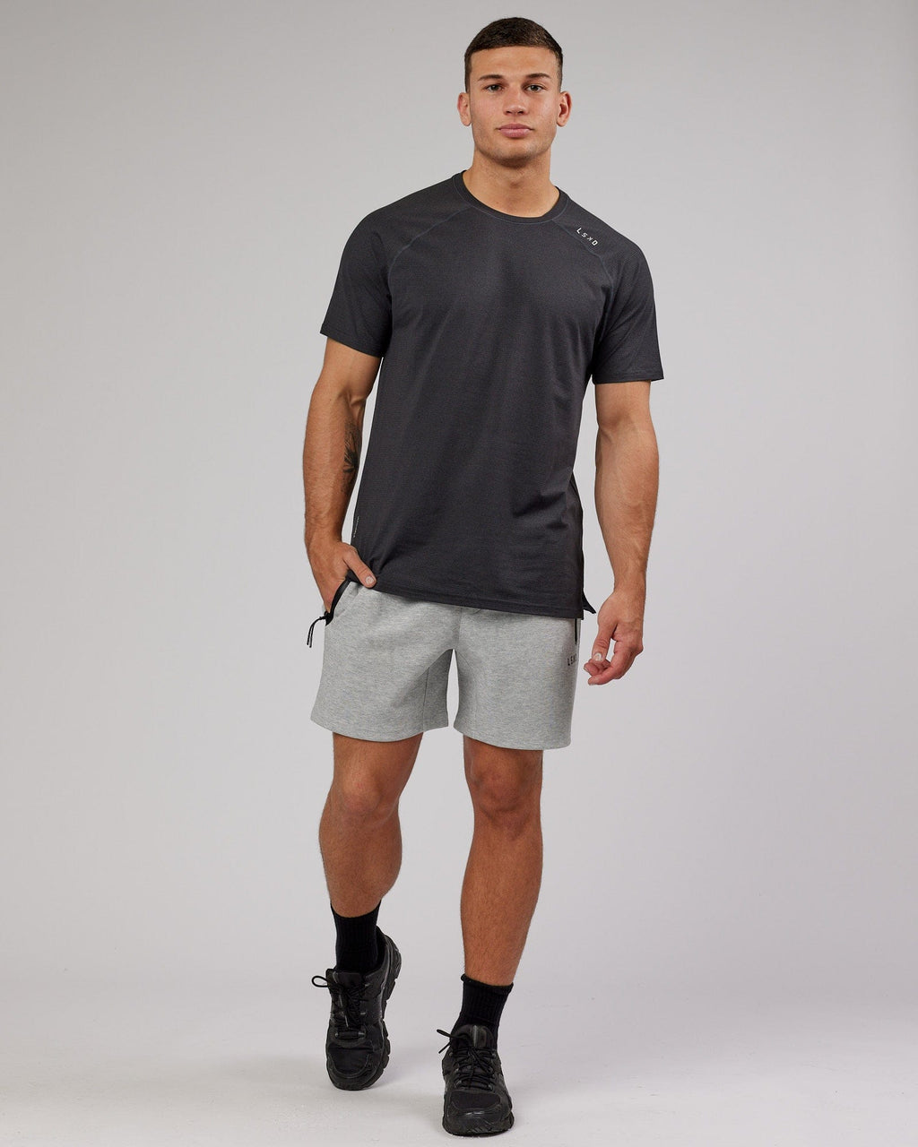 Model wearing Athlete ForgedFleece Track Short - Lt Grey Marl