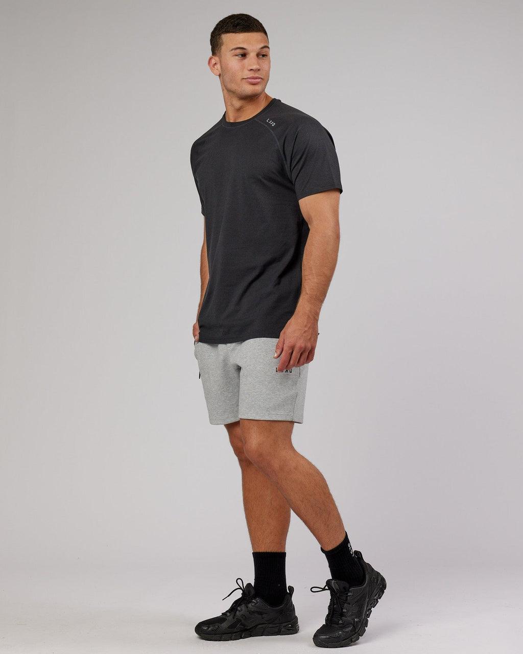 Model wearing Athlete ForgedFleece Track Short - Lt Grey Marl