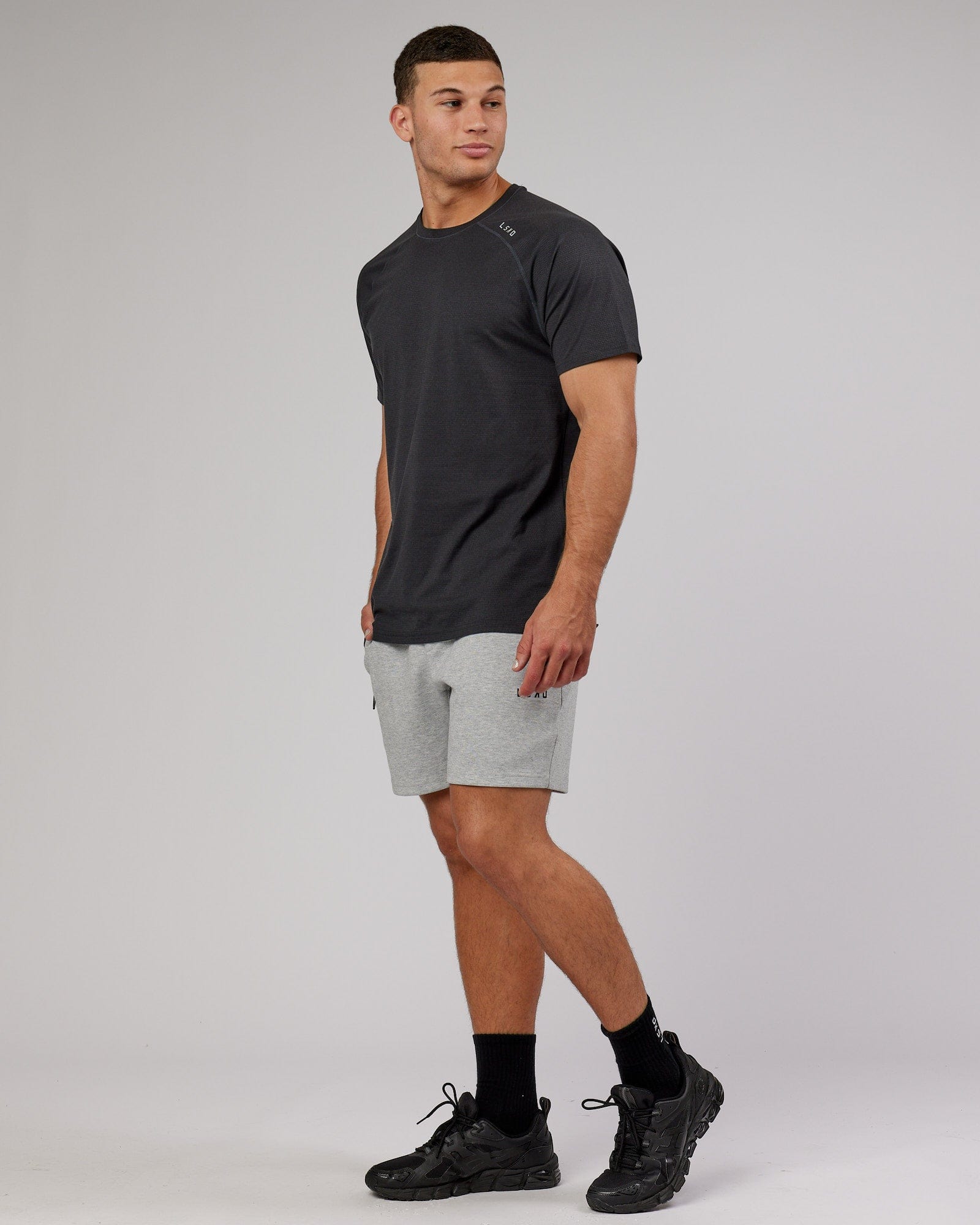 Model wearing Athlete ForgedFleece Track Short - Lt Grey Marl