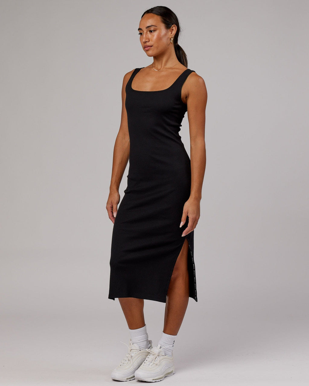 Model wearing Ava Ribbed Tank Dress - Black