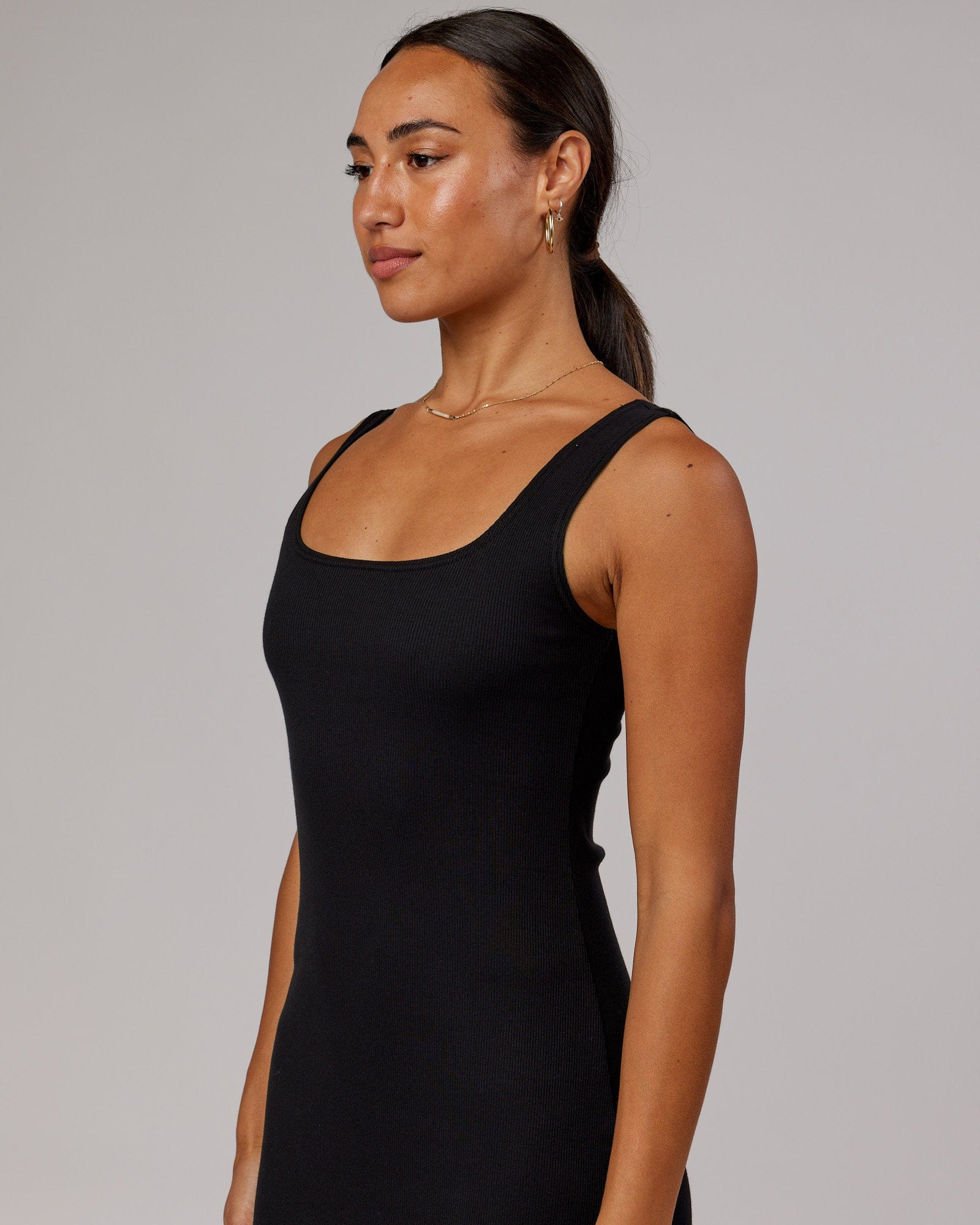 Model wearing Ava Ribbed Tank Dress - Black