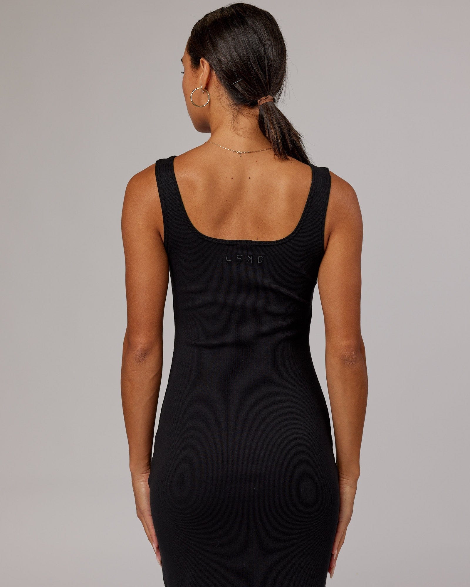 Model wearing Ava Ribbed Tank Dress - Black
