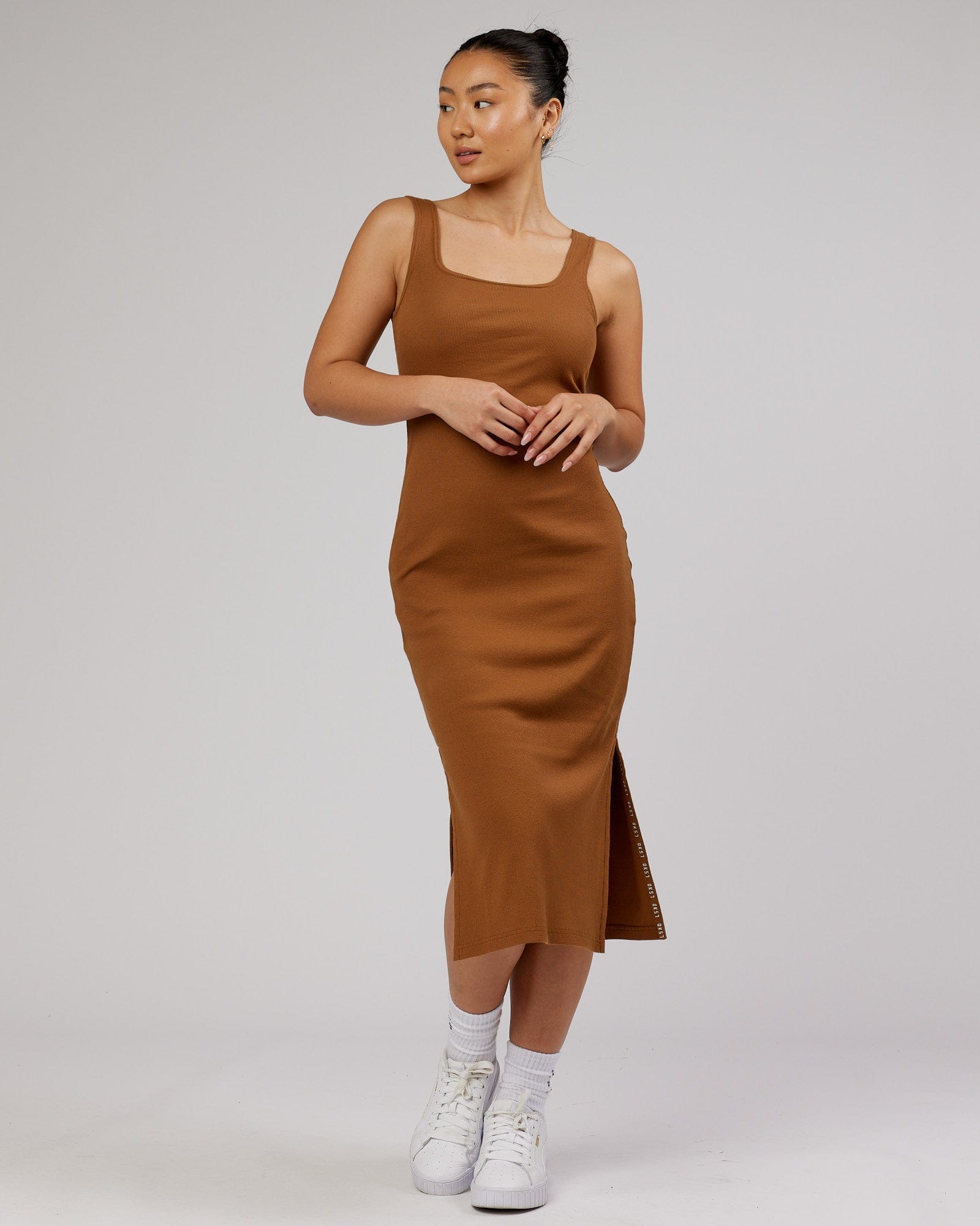 Model wearing Ava Ribbed Tank Dress - Camel