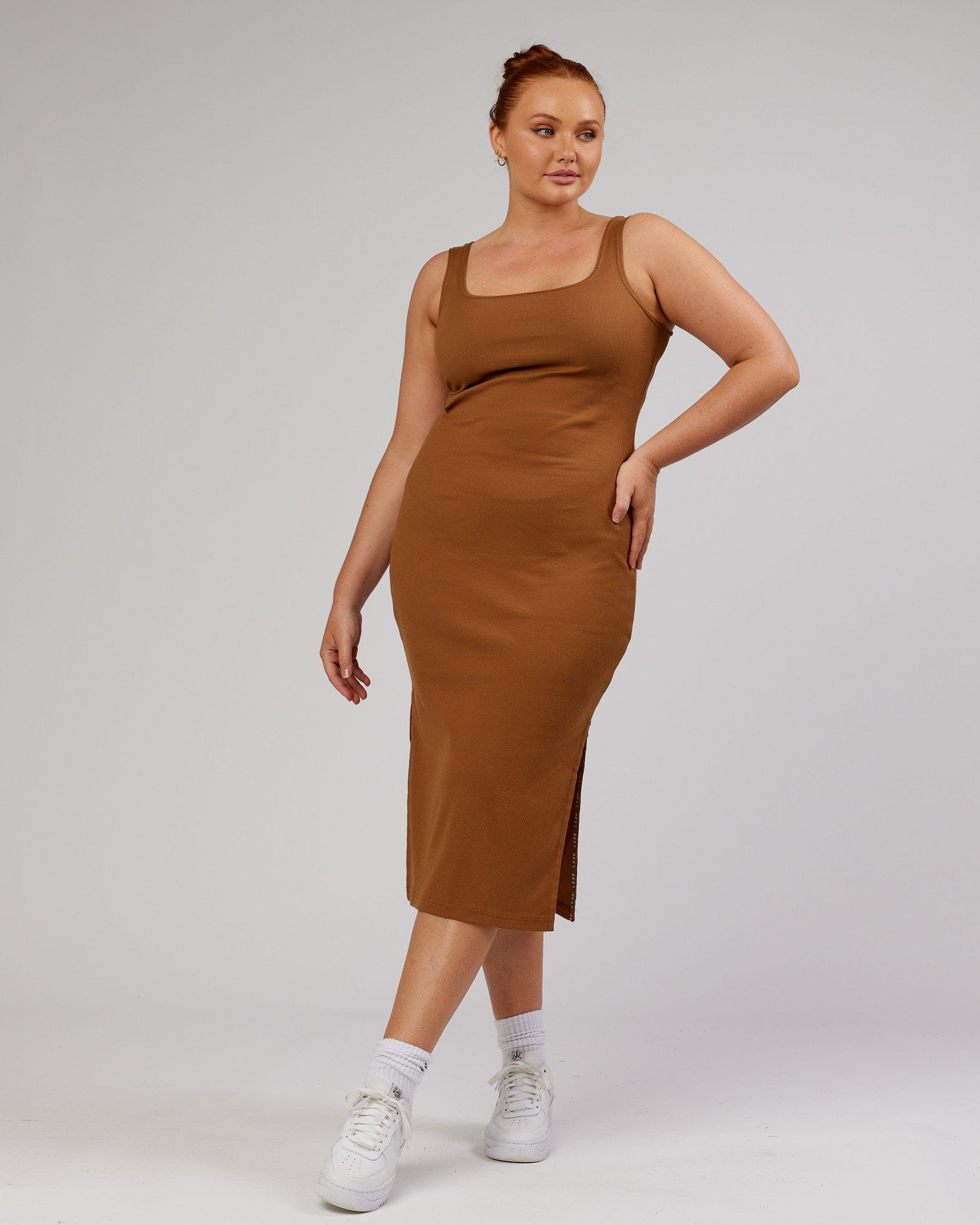 Model wearing Ava Ribbed Tank Dress - Camel