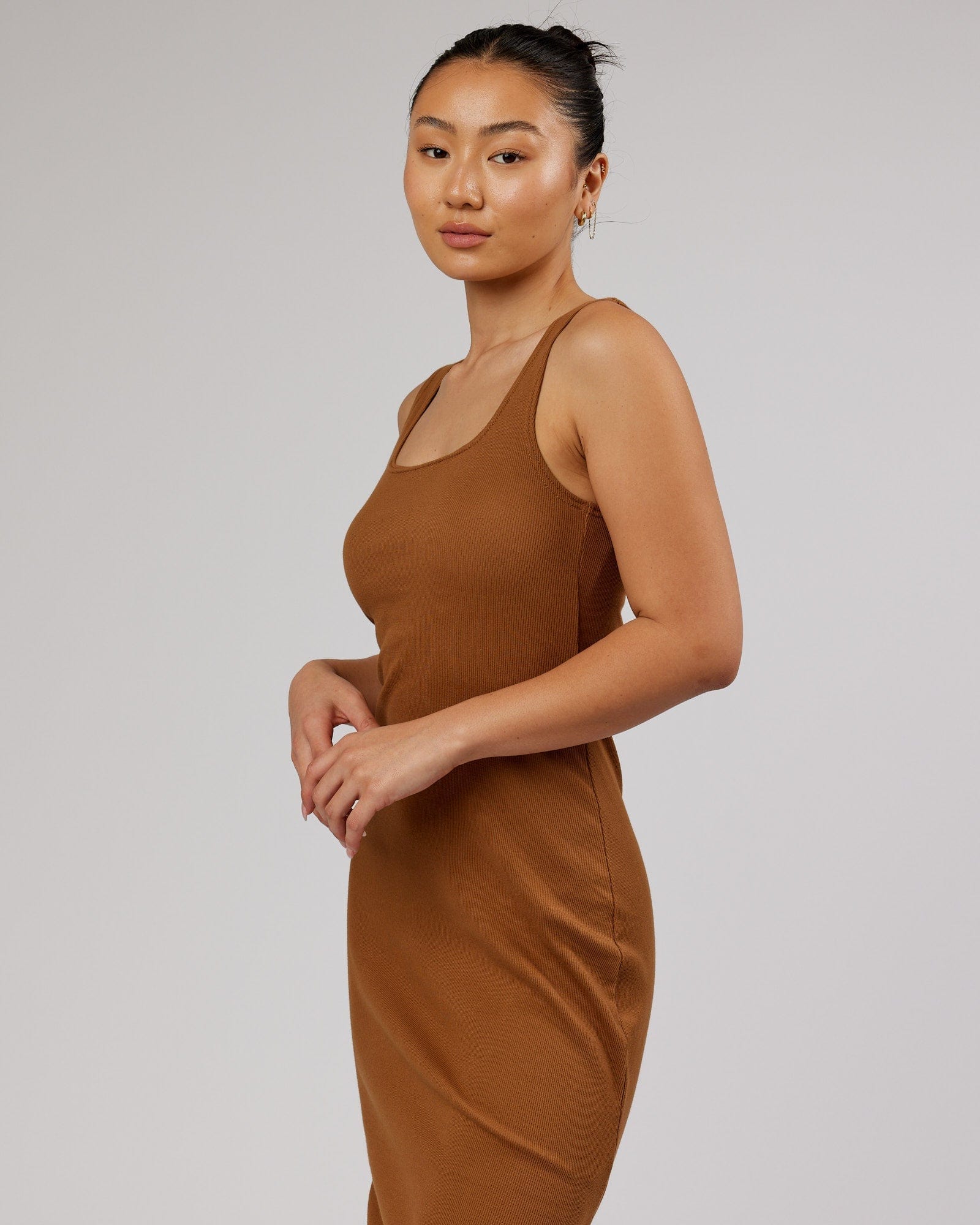 Model wearing Ava Ribbed Tank Dress - Camel