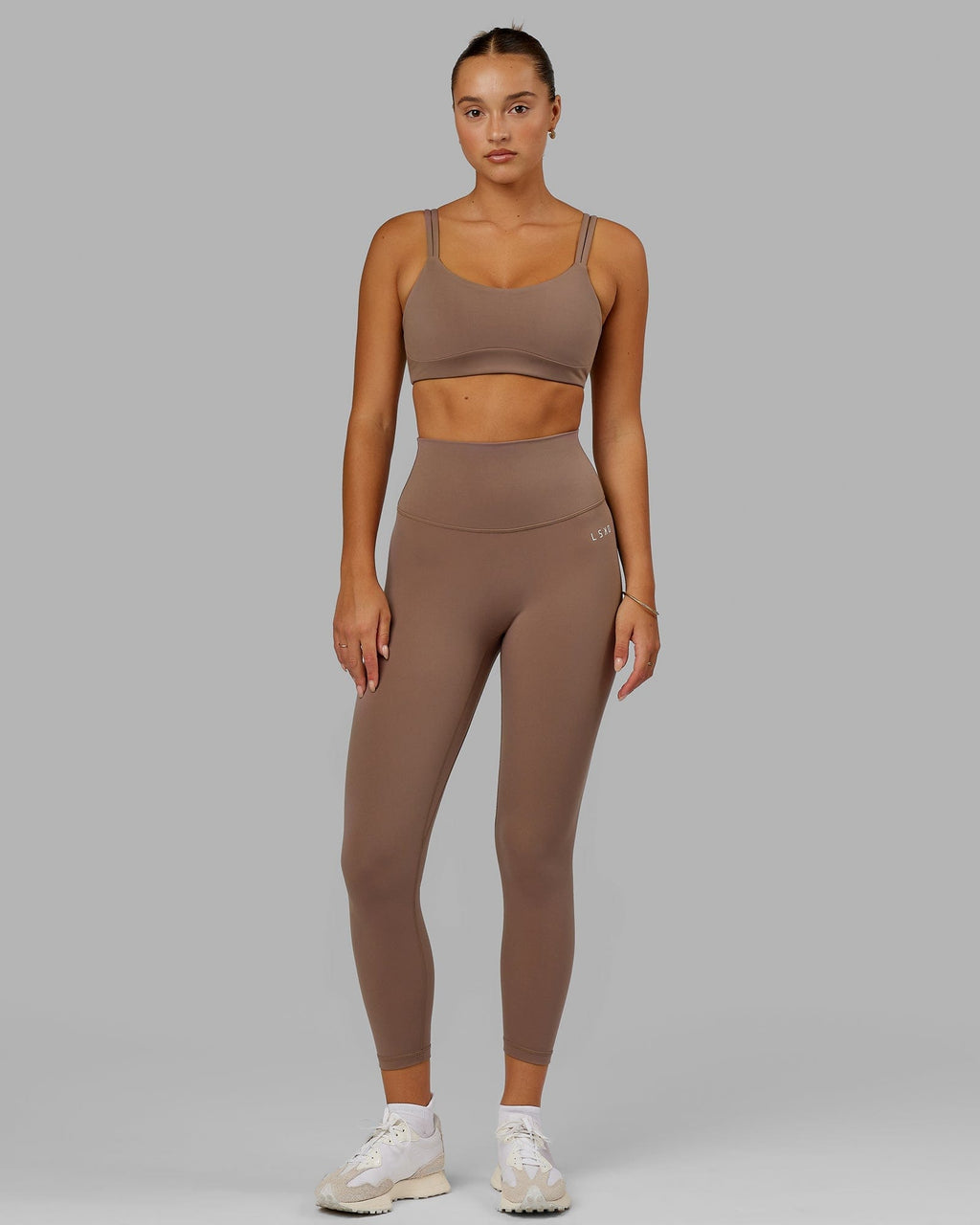 Model wearing Base 2.0 7/8 Length Tight - Deep Taupe