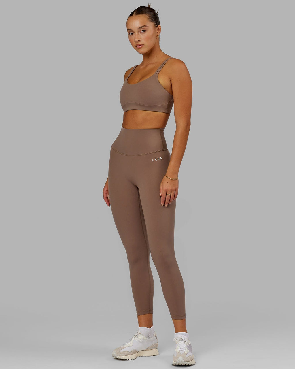 Model wearing Base 2.0 7/8 Length Tight - Deep Taupe