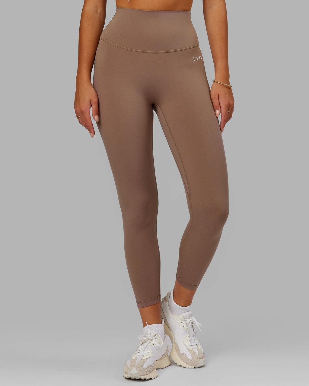 Model wearing Base 2.0 7/8 Length Tight - Deep Taupe