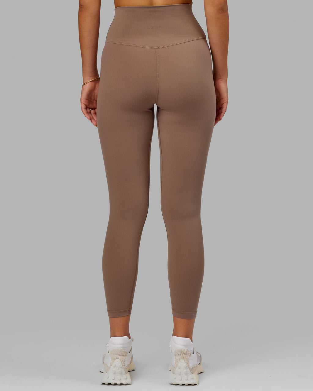 Model wearing Base 2.0 7/8 Length Tight - Deep Taupe