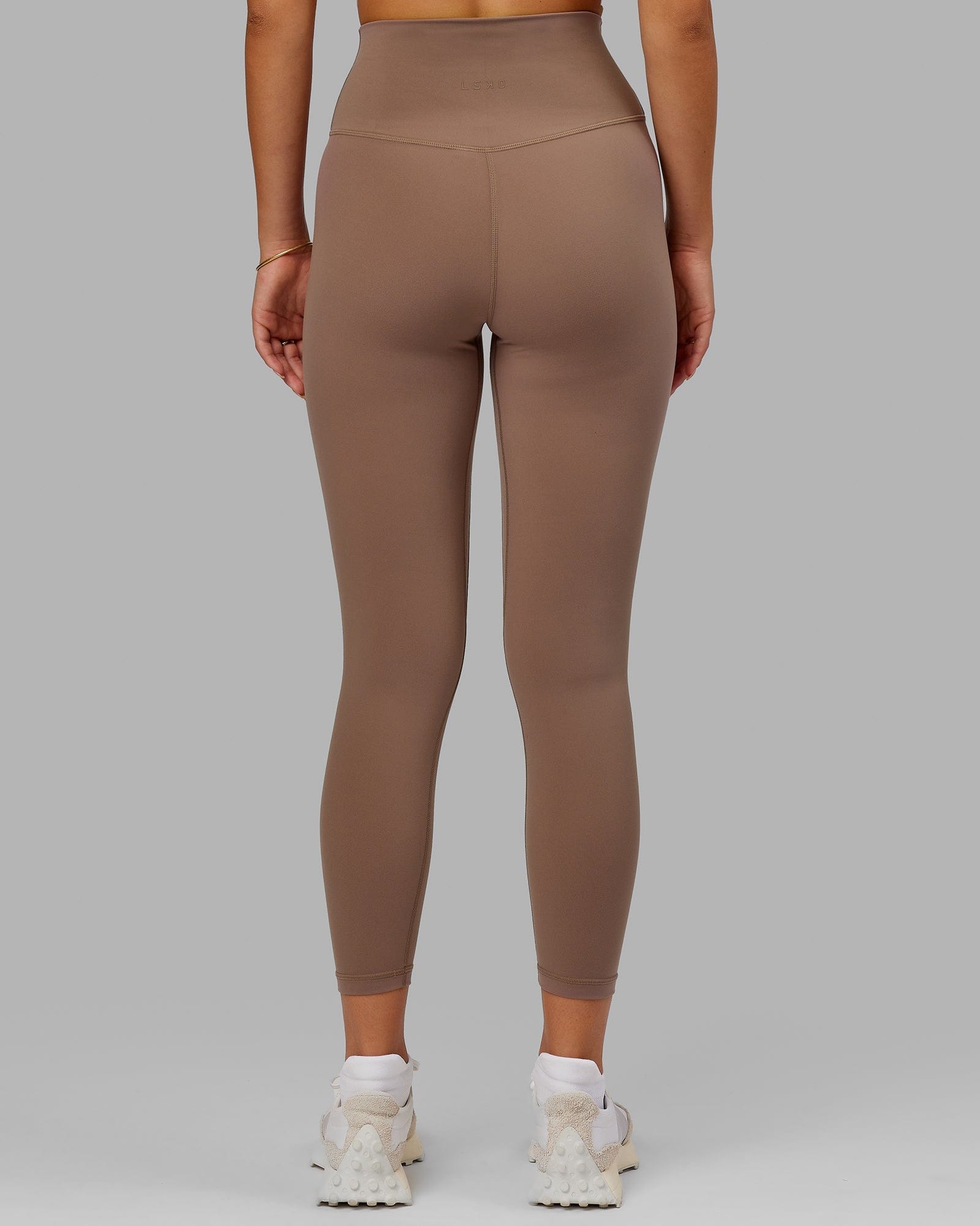 Model wearing Base 2.0 7/8 Length Tight - Deep Taupe