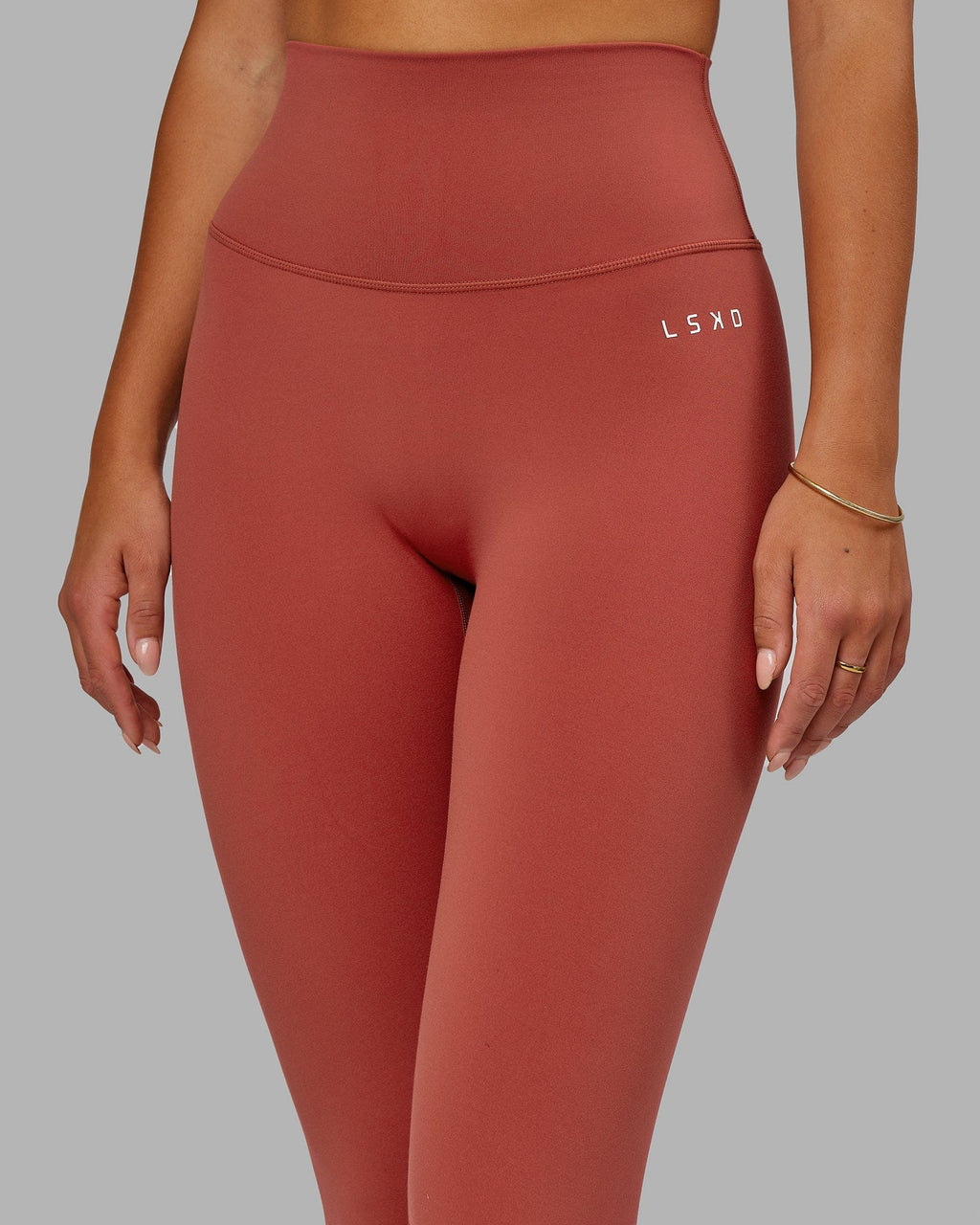 Model wearing Base 2.0 7/8 Length Tight - Paprika
