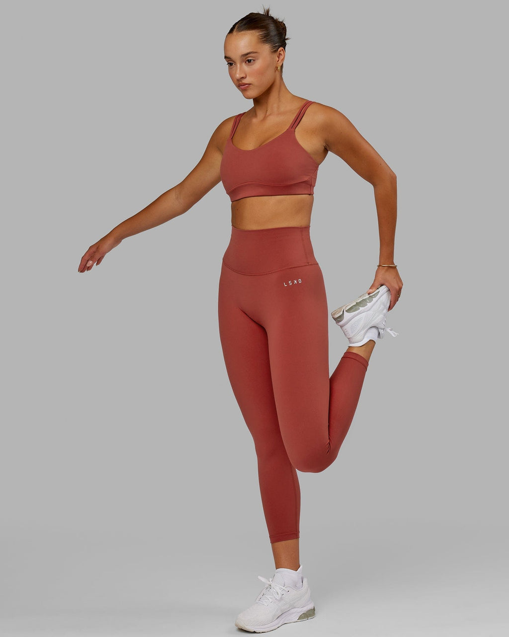 Model wearing Base 2.0 7/8 Length Tight - Paprika
