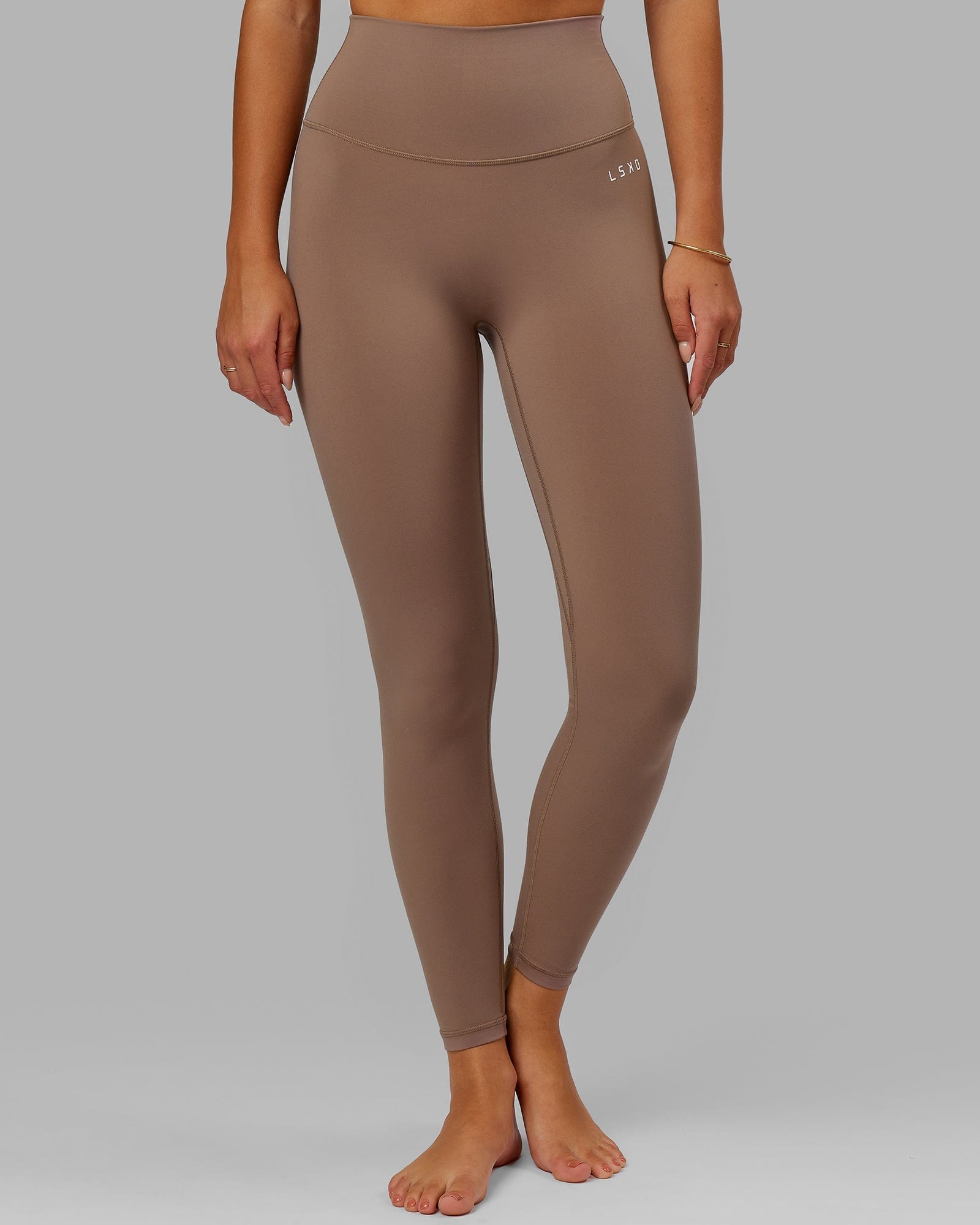 Model wearing Base 2.0 Full Length Tight - Deep Taupe