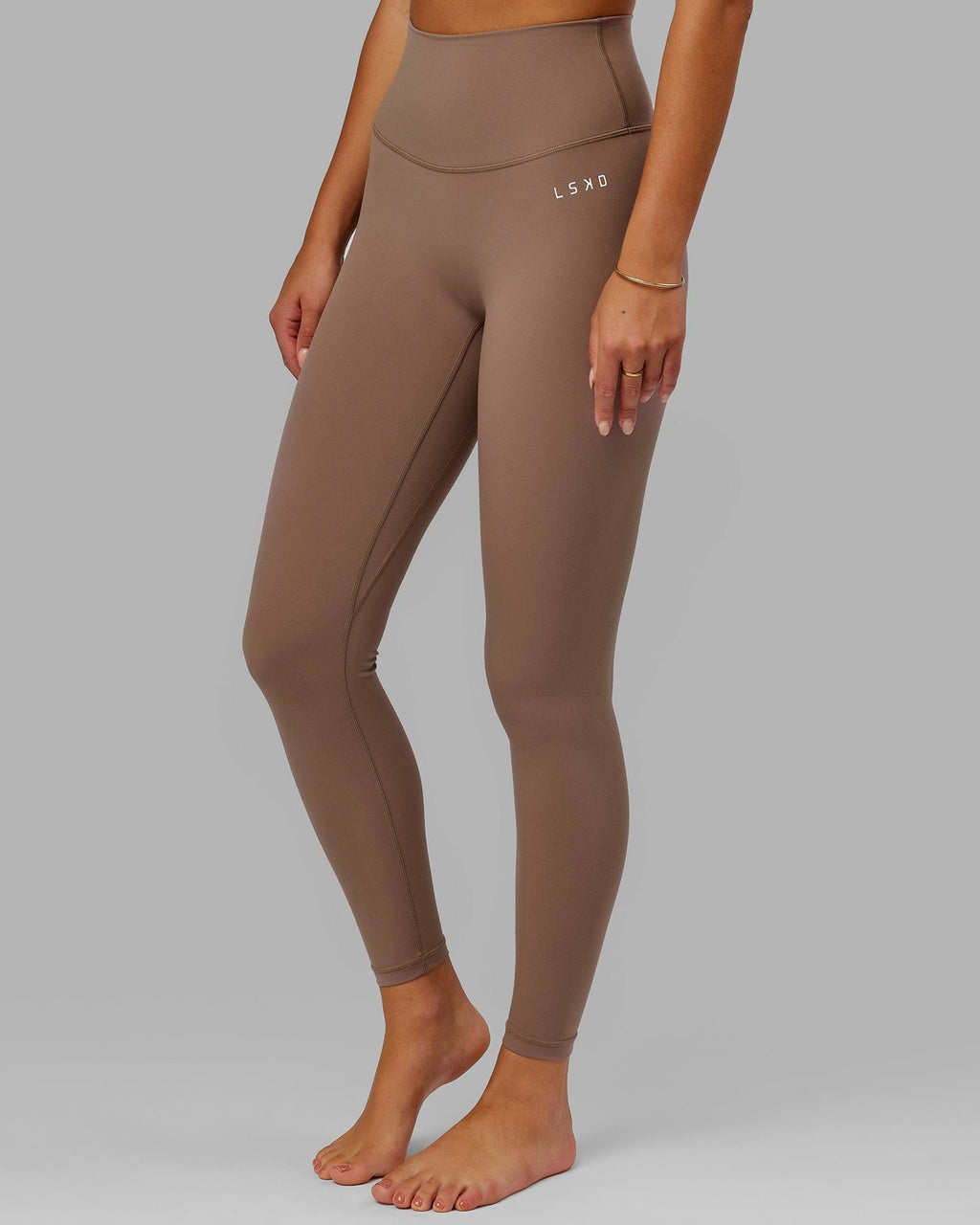 Model wearing Base 2.0 Full Length Tight - Deep Taupe