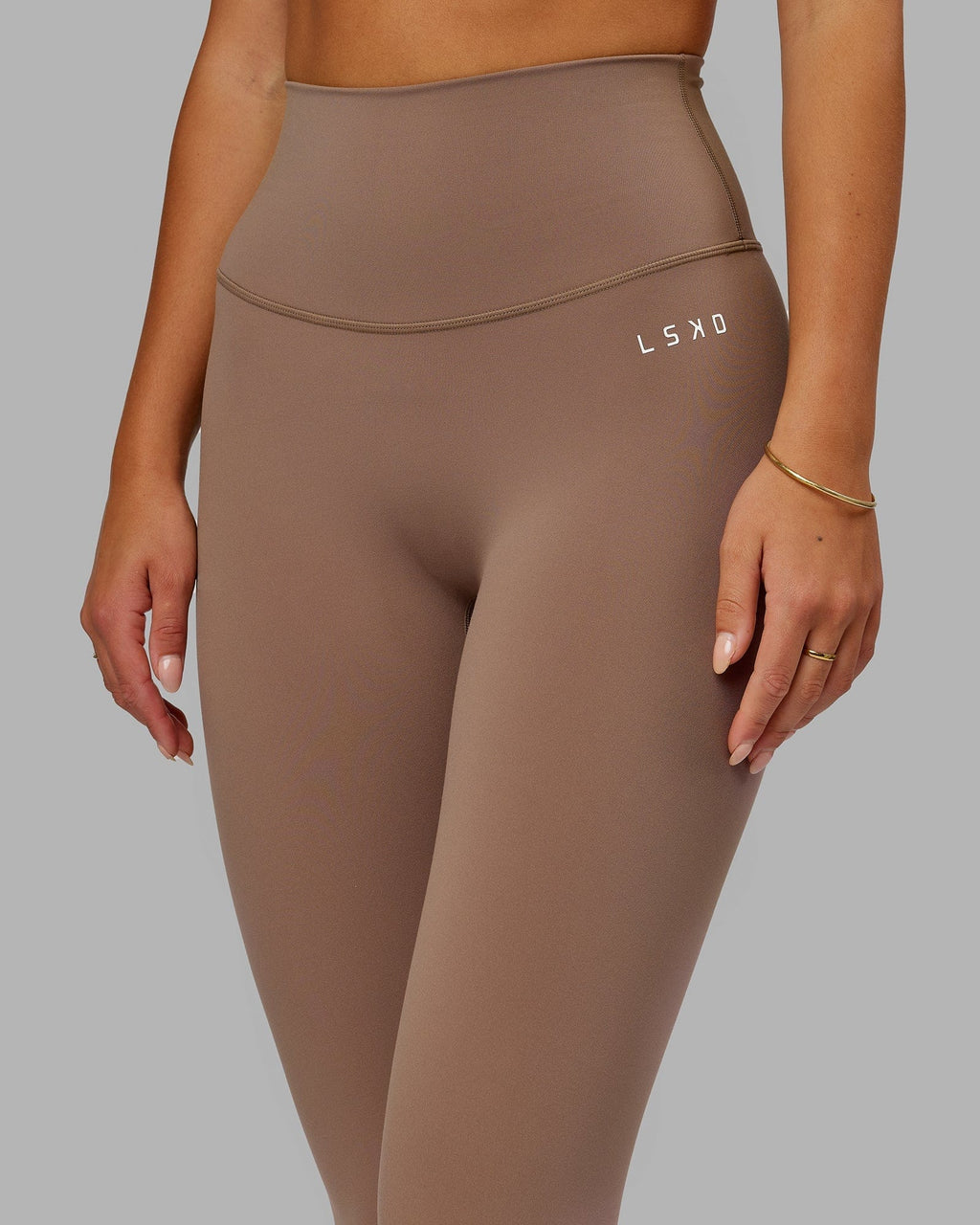 Model wearing Base 2.0 Full Length Tight - Deep Taupe