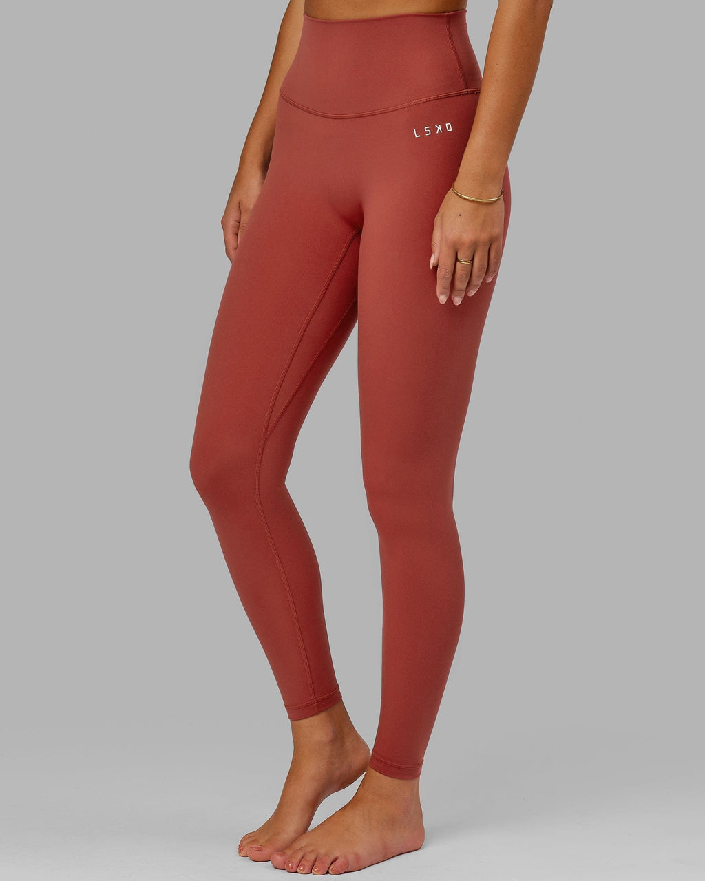 Model wearing Base 2.0 Full Length Tight - Paprika
