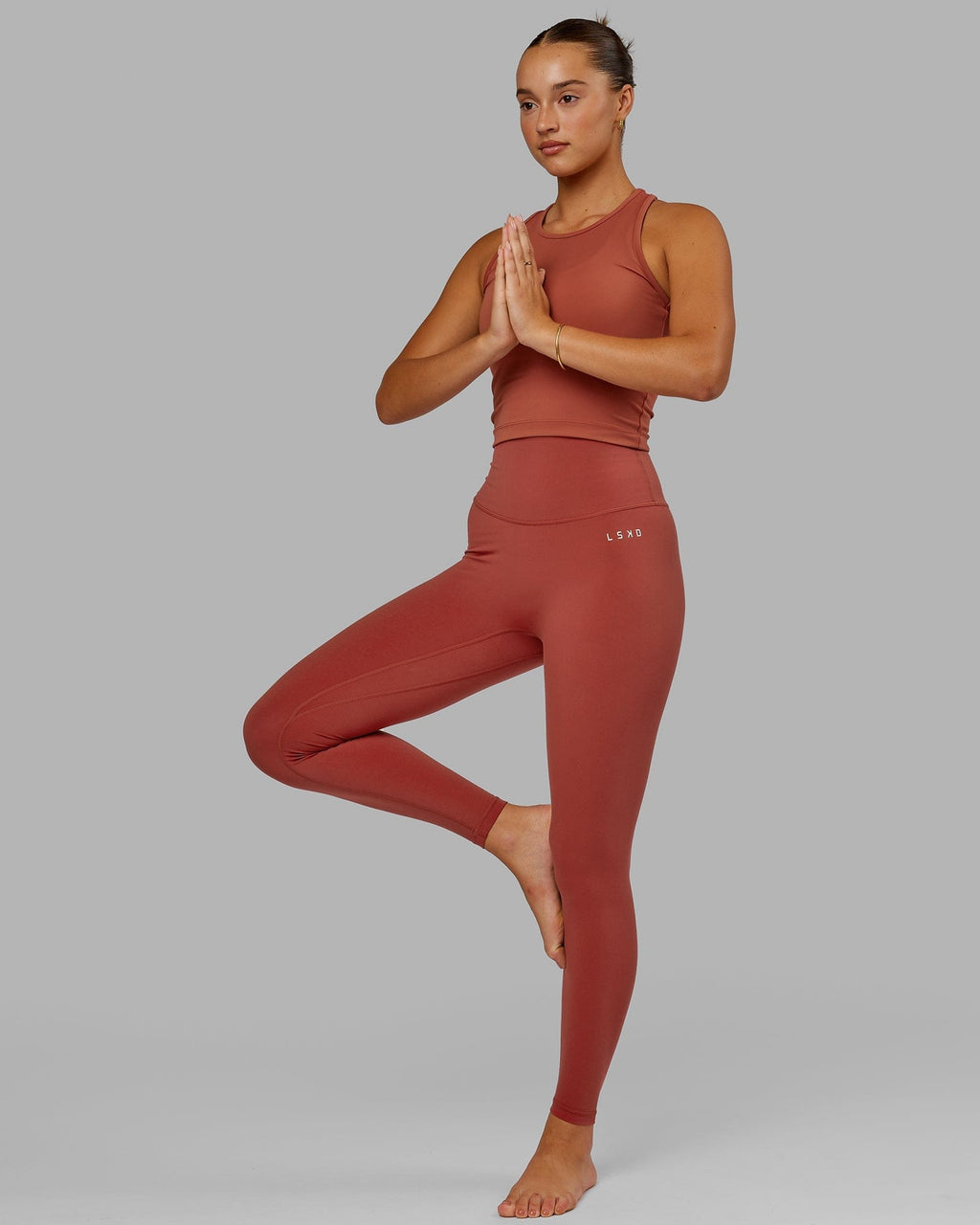 Model wearing Base 2.0 Full Length Tight - Paprika