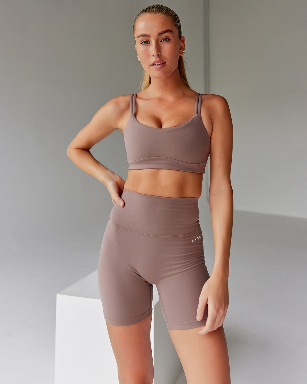 Model wearing Base 2.0 Mid Short Tight - Deep Taupe