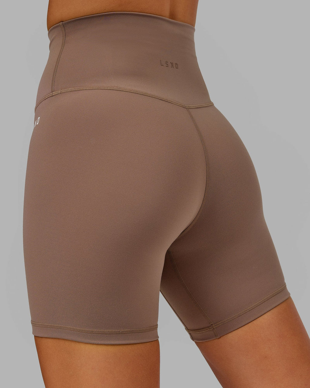 Model wearing Base 2.0 Mid Short Tight - Deep Taupe