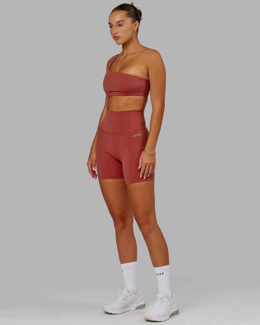 Model wearing Base 2.0 Mid Short Tight - Paprika