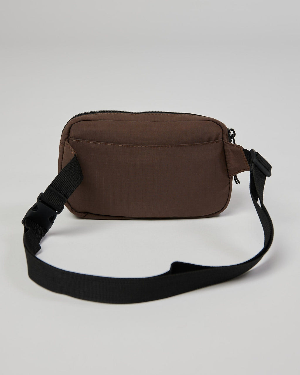 Model wearing Base Cross Body Bag - Walnut