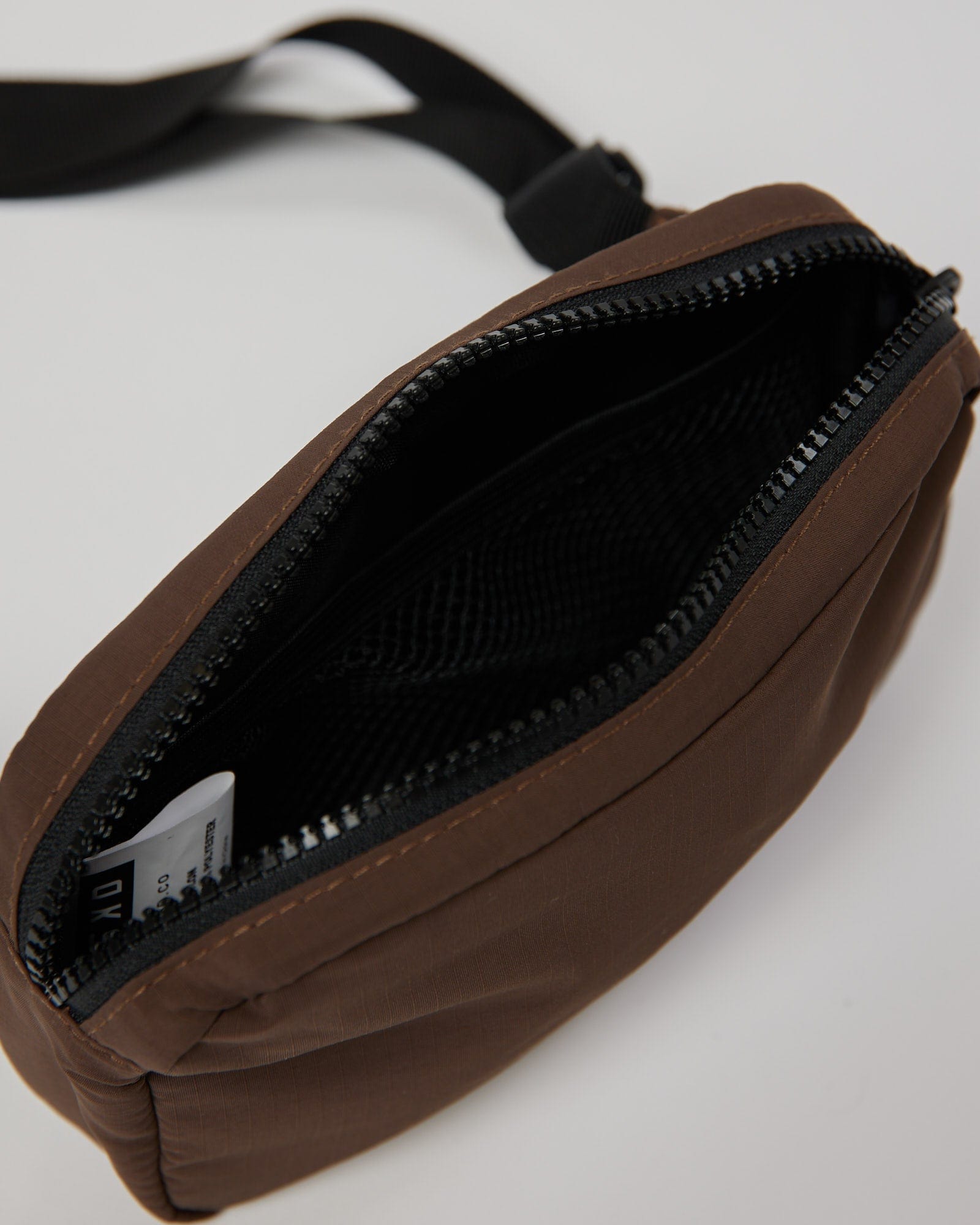 Model wearing Base Cross Body Bag - Walnut