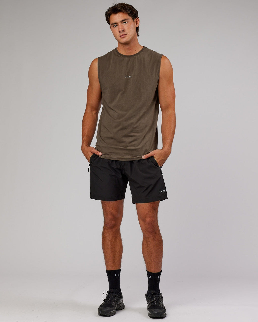 Model wearing Base FLXCotton Tank - Army Green