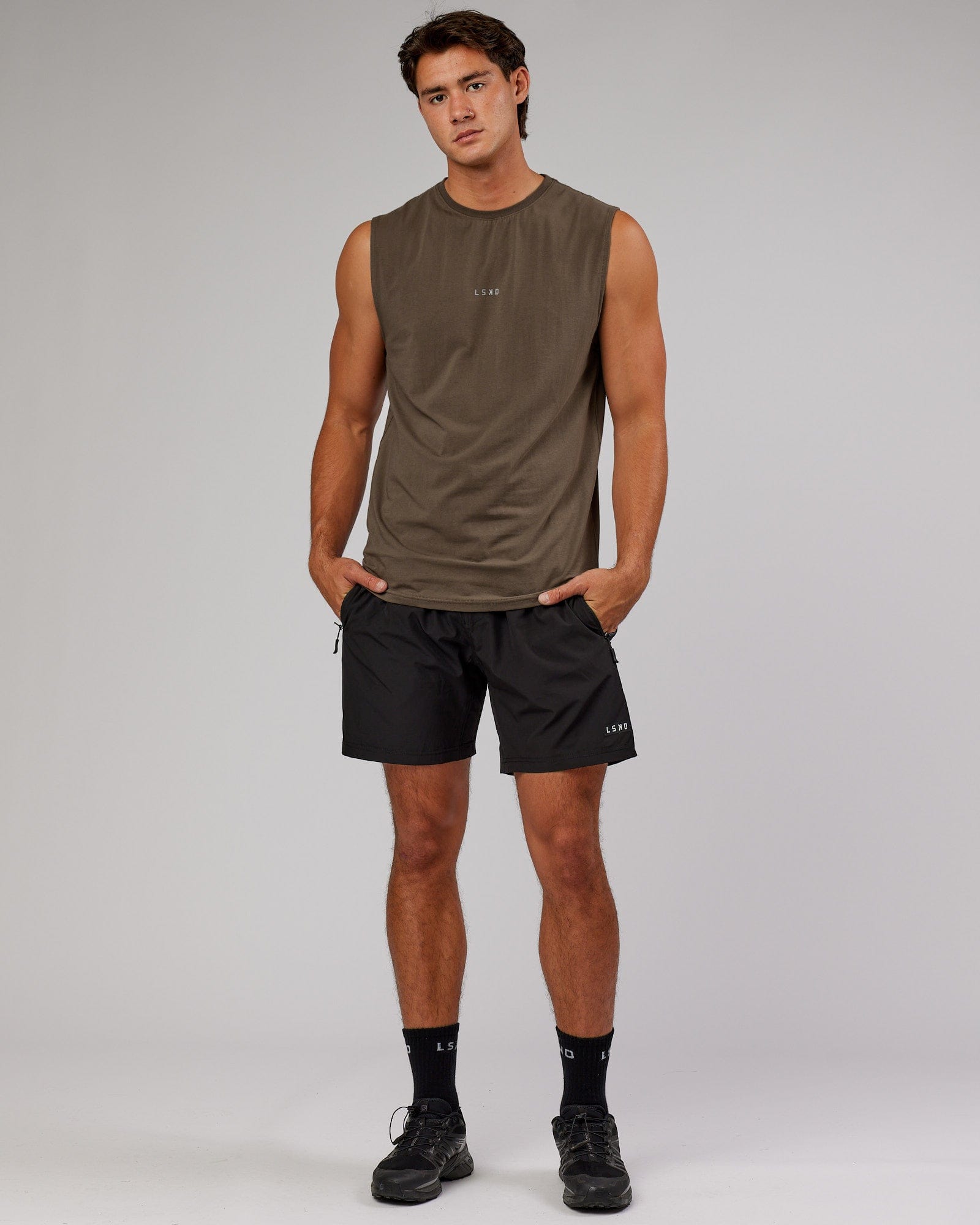 Model wearing Base FLXCotton Tank - Army Green