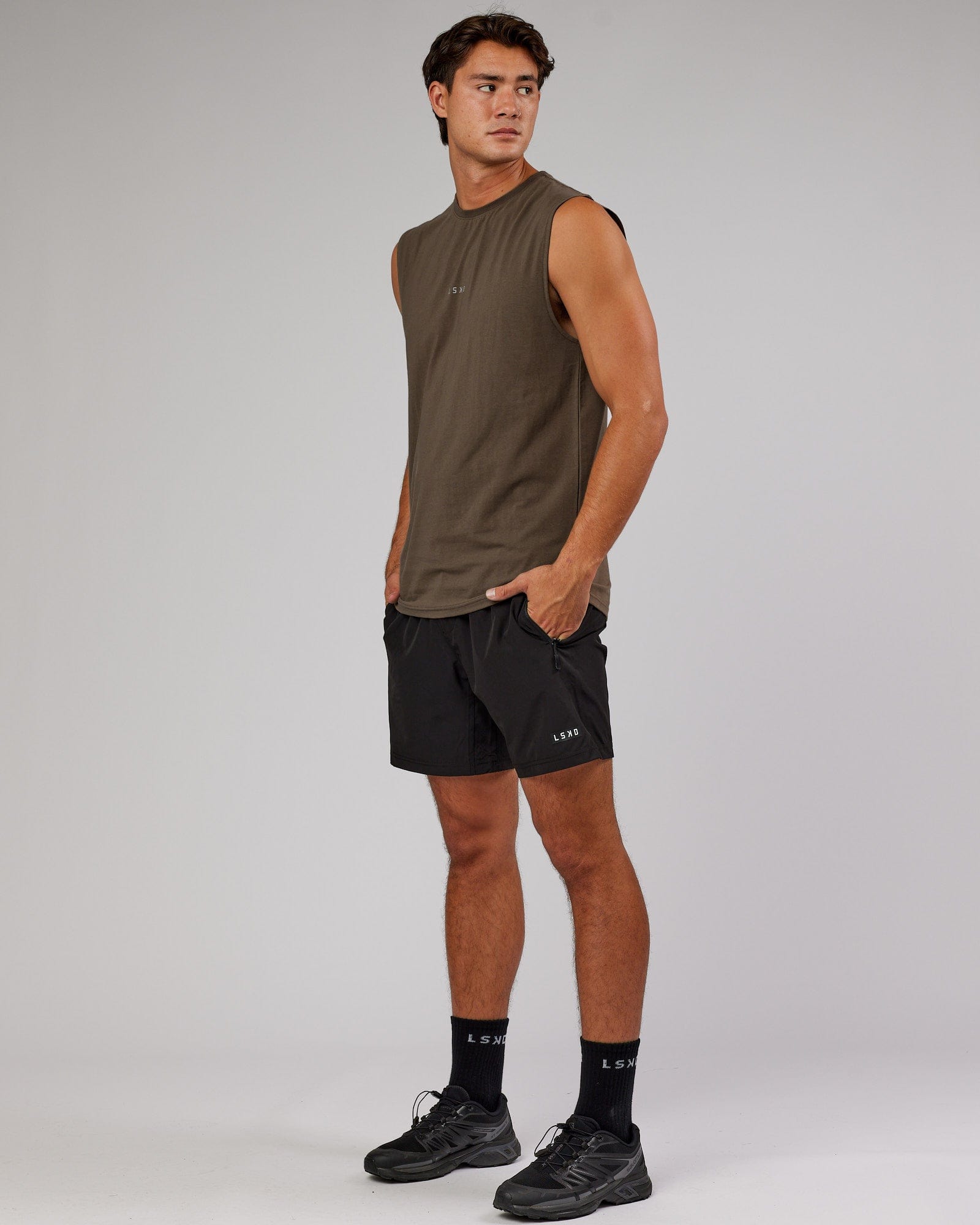 Model wearing Base FLXCotton Tank - Army Green