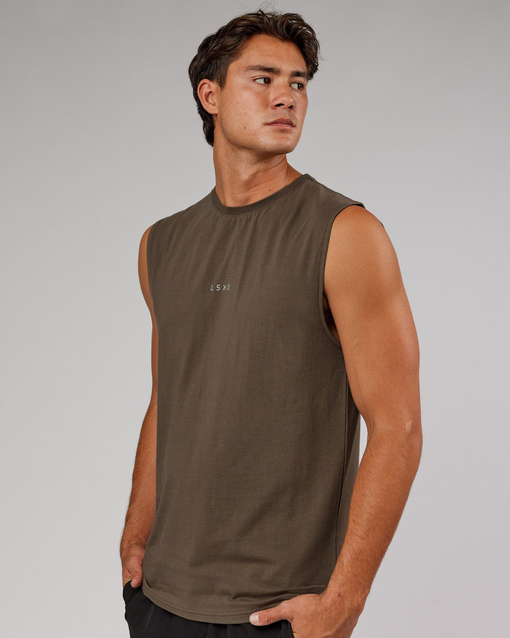 Model wearing Base FLXCotton Tank - Army Green