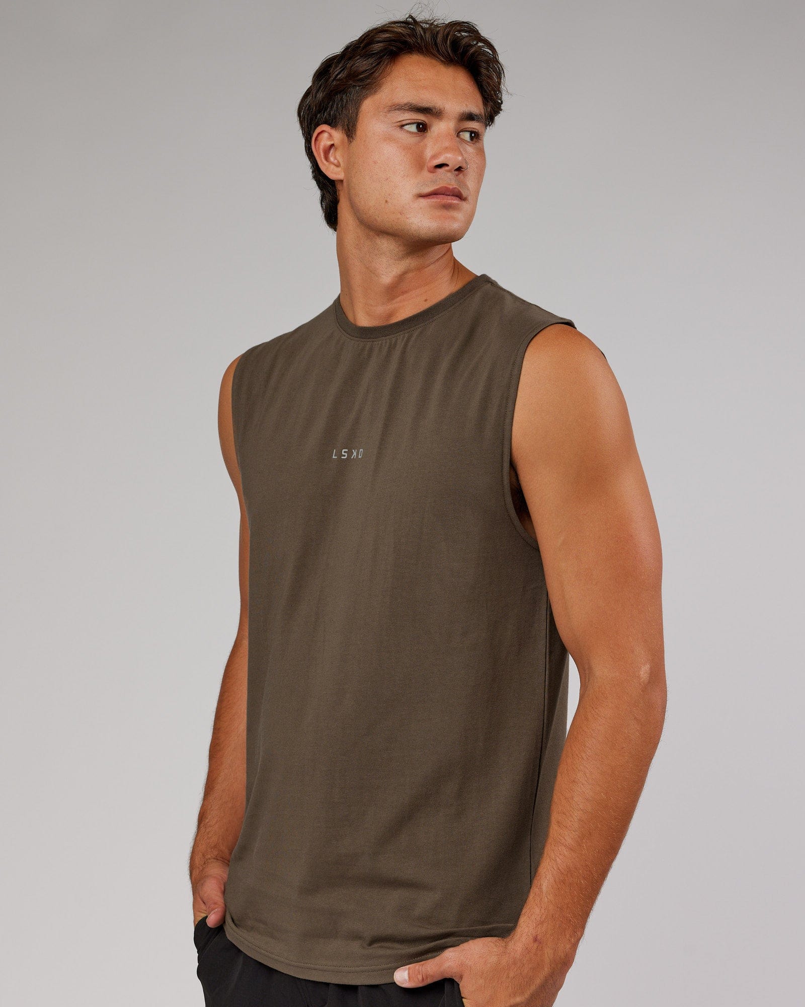 Model wearing Base FLXCotton Tank - Army Green