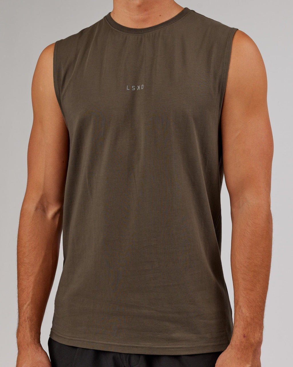 Model wearing Base FLXCotton Tank - Army Green