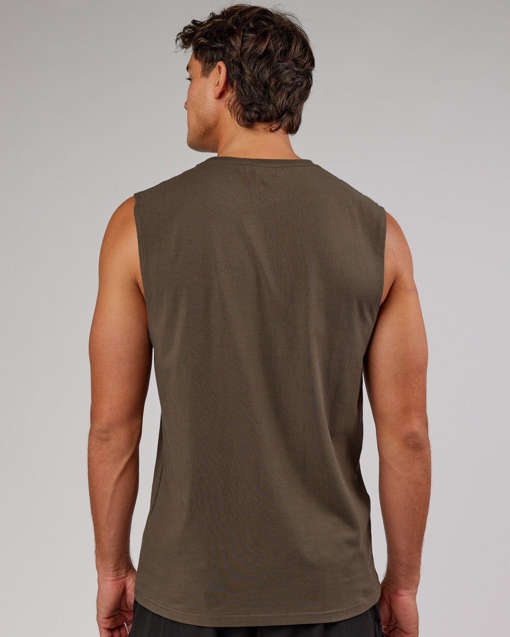 Model wearing Base FLXCotton Tank - Army Green