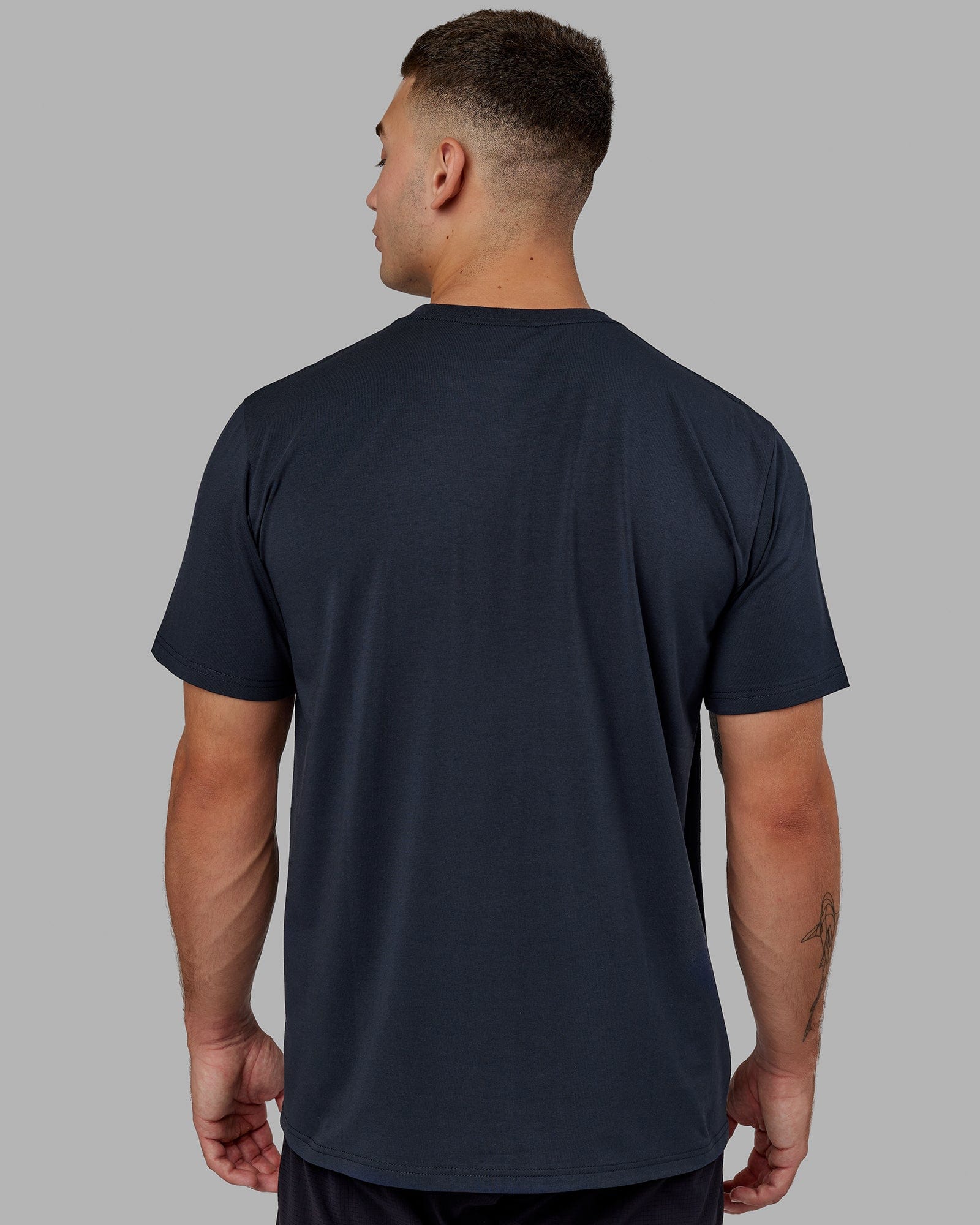 Model wearing Base FLXCotton Tee - Navy