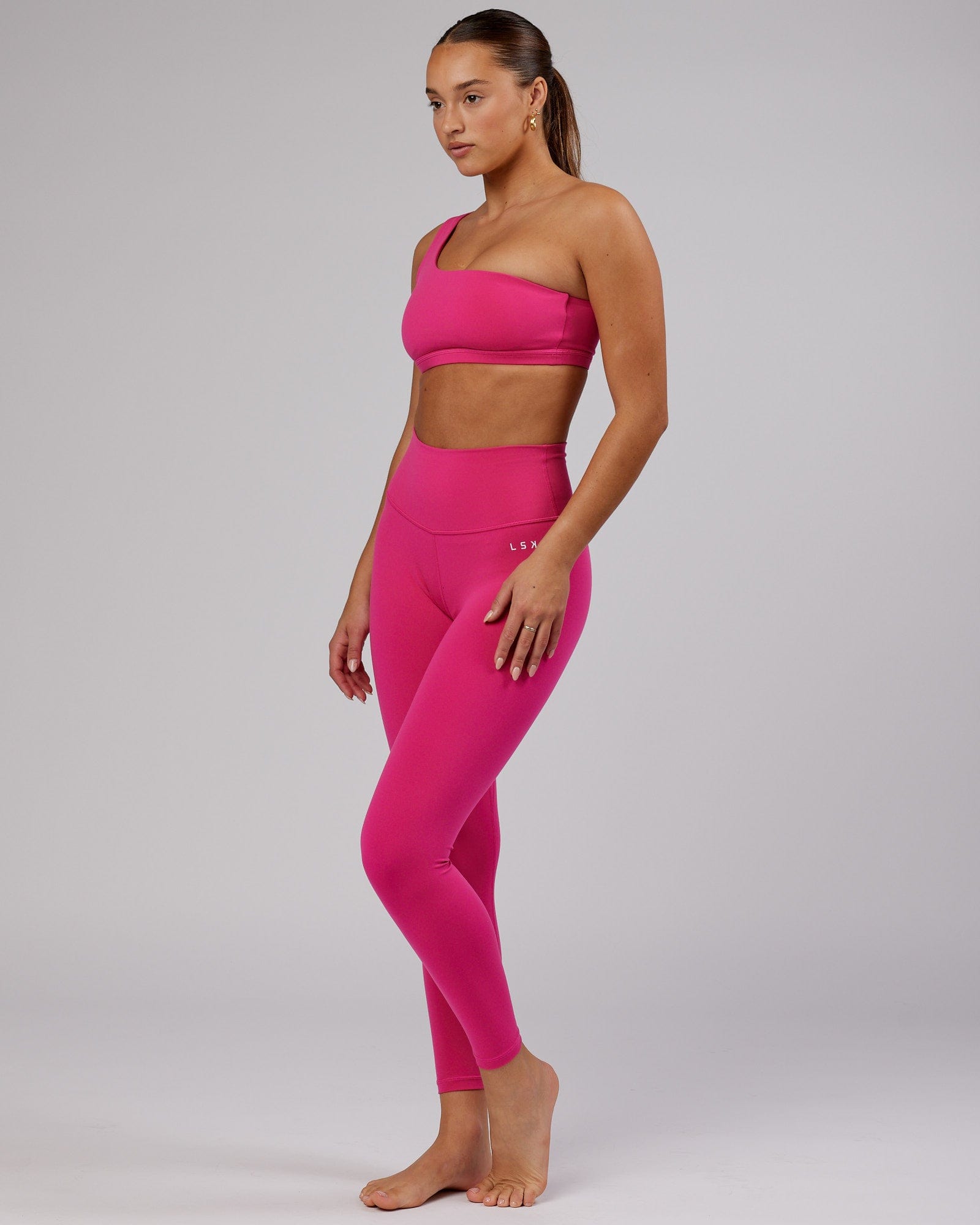 Model wearing Base Full Length Tight - Magenta