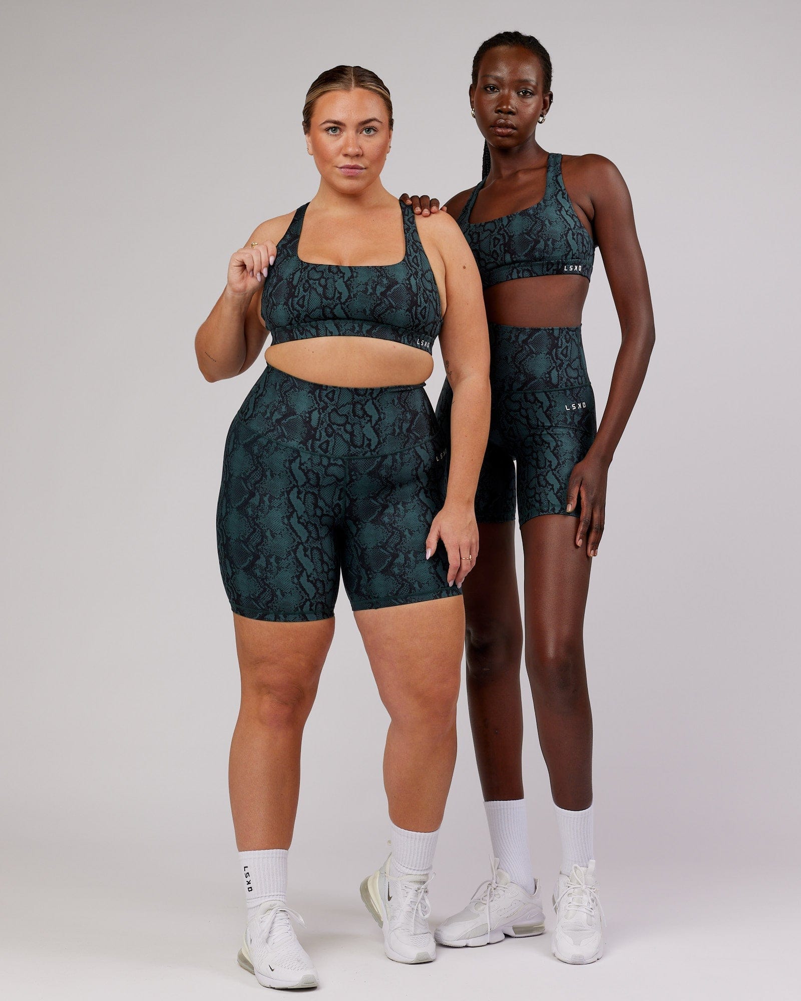 Model wearing Base Mid Short Tight - Forest Snakeskin