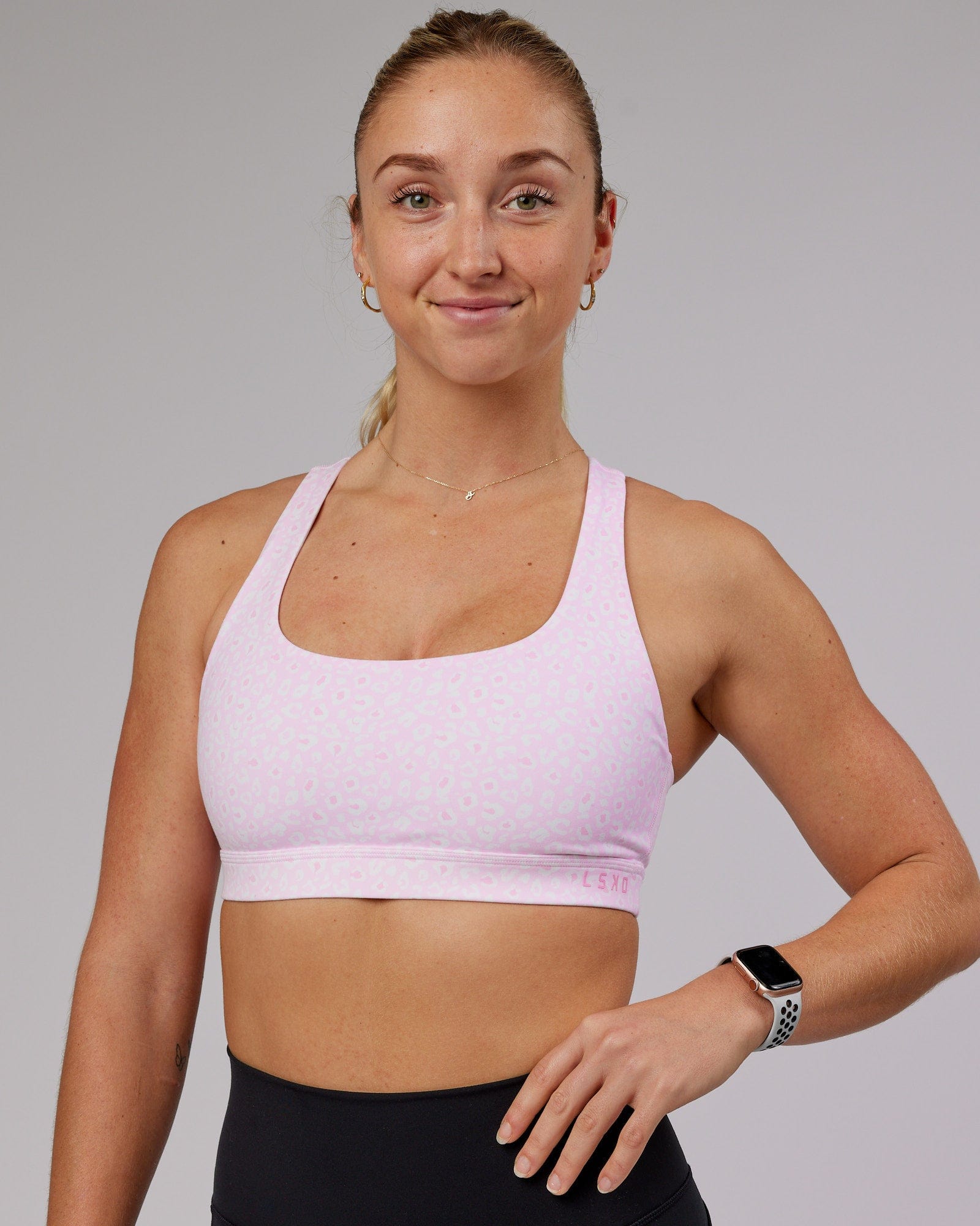 Model wearing Base Sports Bra - Blush Leopard