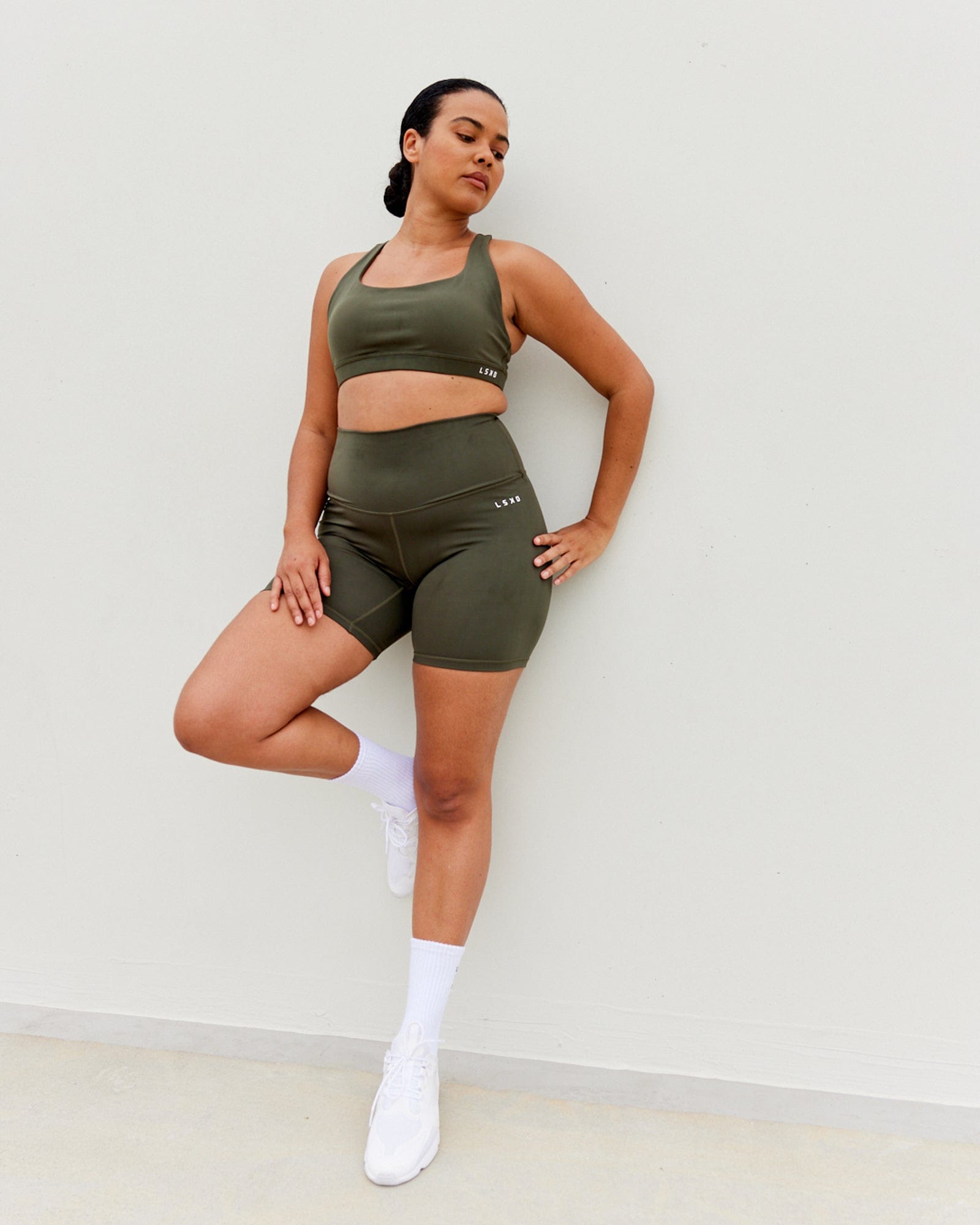 Model wearing Base Sports Bra - Forest Night