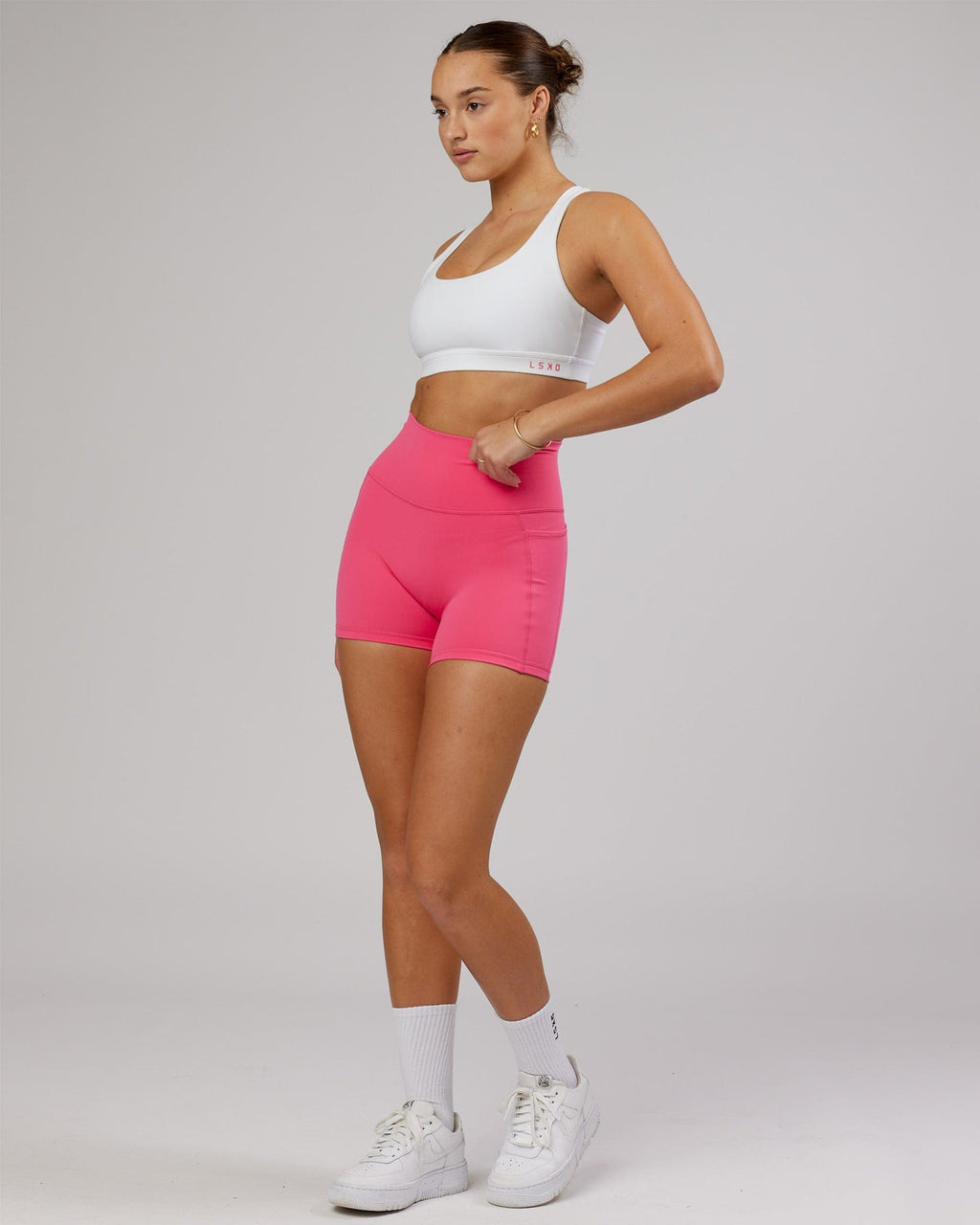 Model wearing Base Sports Bra - White-Flamingo