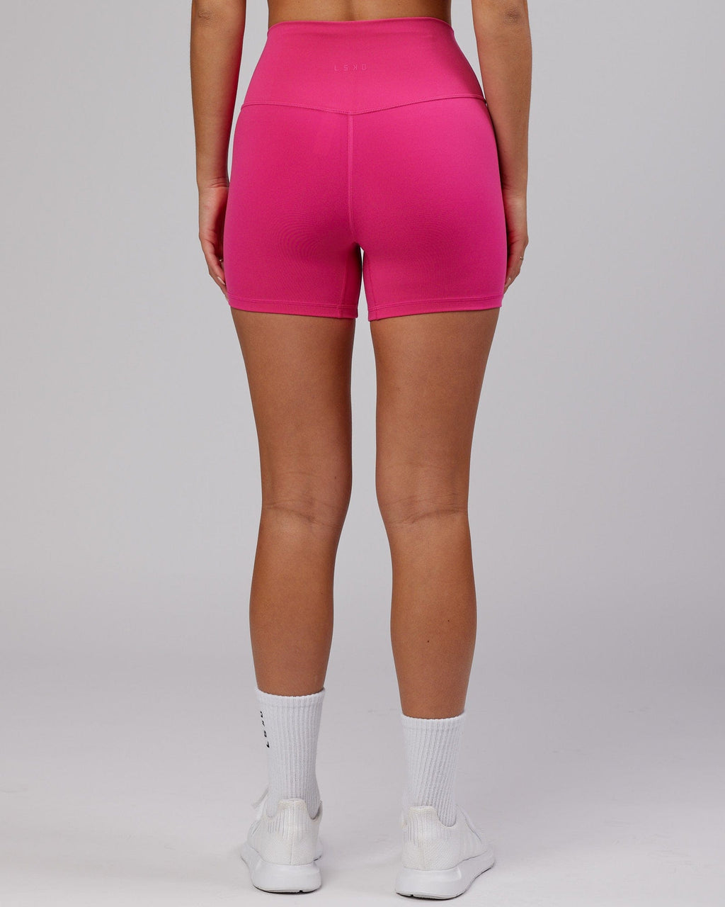 Model wearing Base X-Short Tight - Magenta