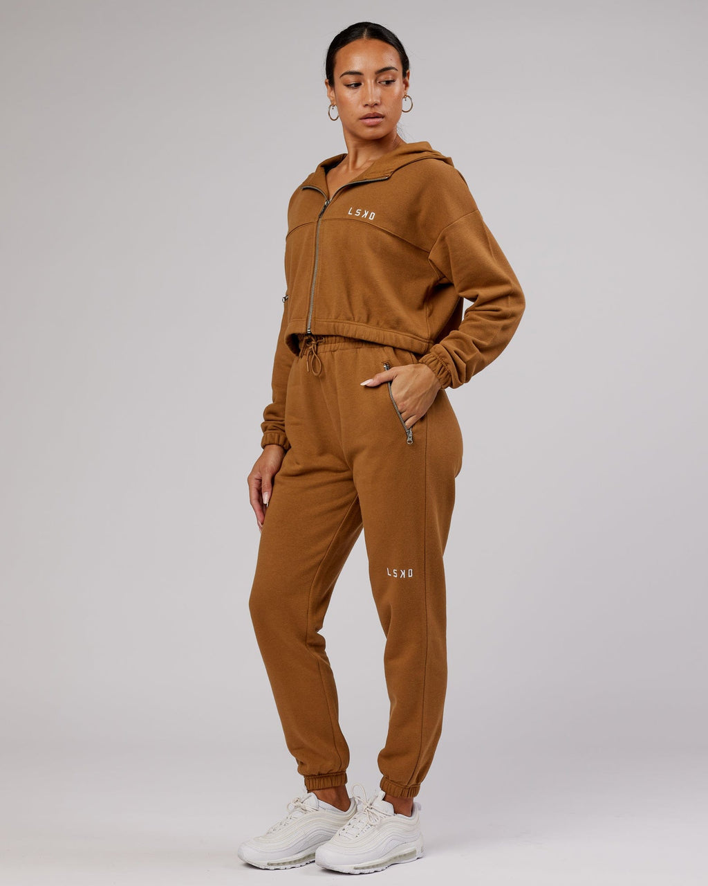 Model wearing Becca Track Pant - Camel