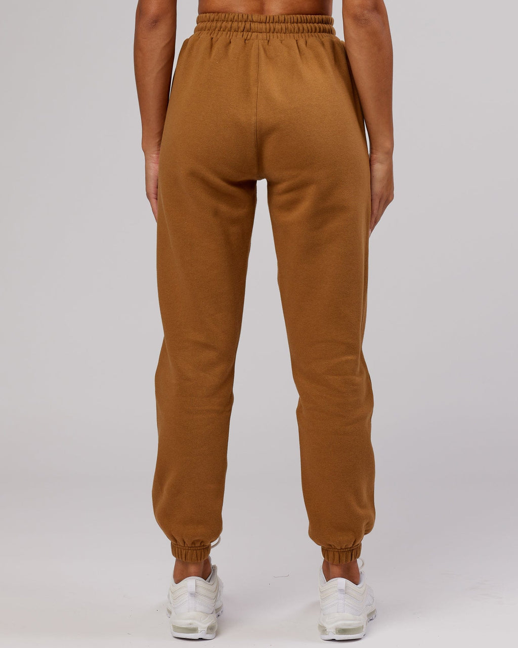 Model wearing Becca Track Pant - Camel