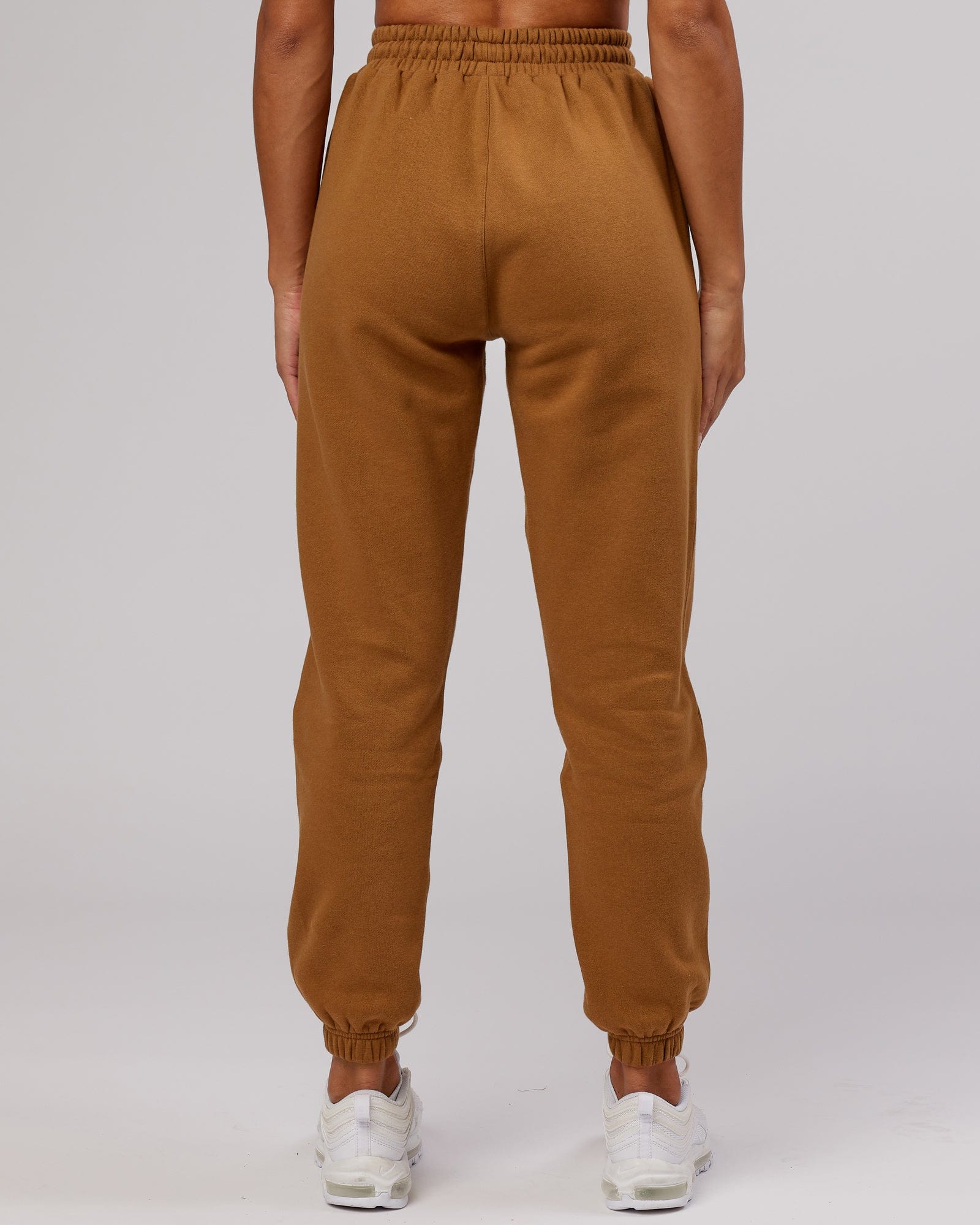 Model wearing Becca Track Pant - Camel