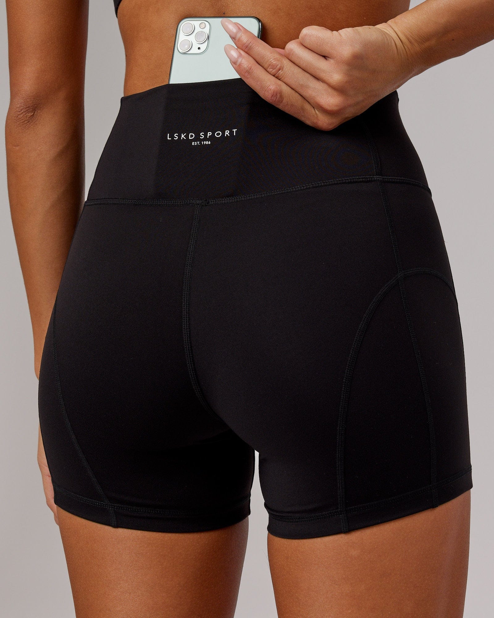 Model wearing Bend X-Short Tight - Black