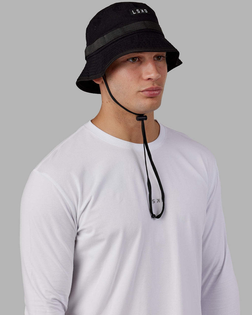 Model wearing Performance Boonie Hat - Black